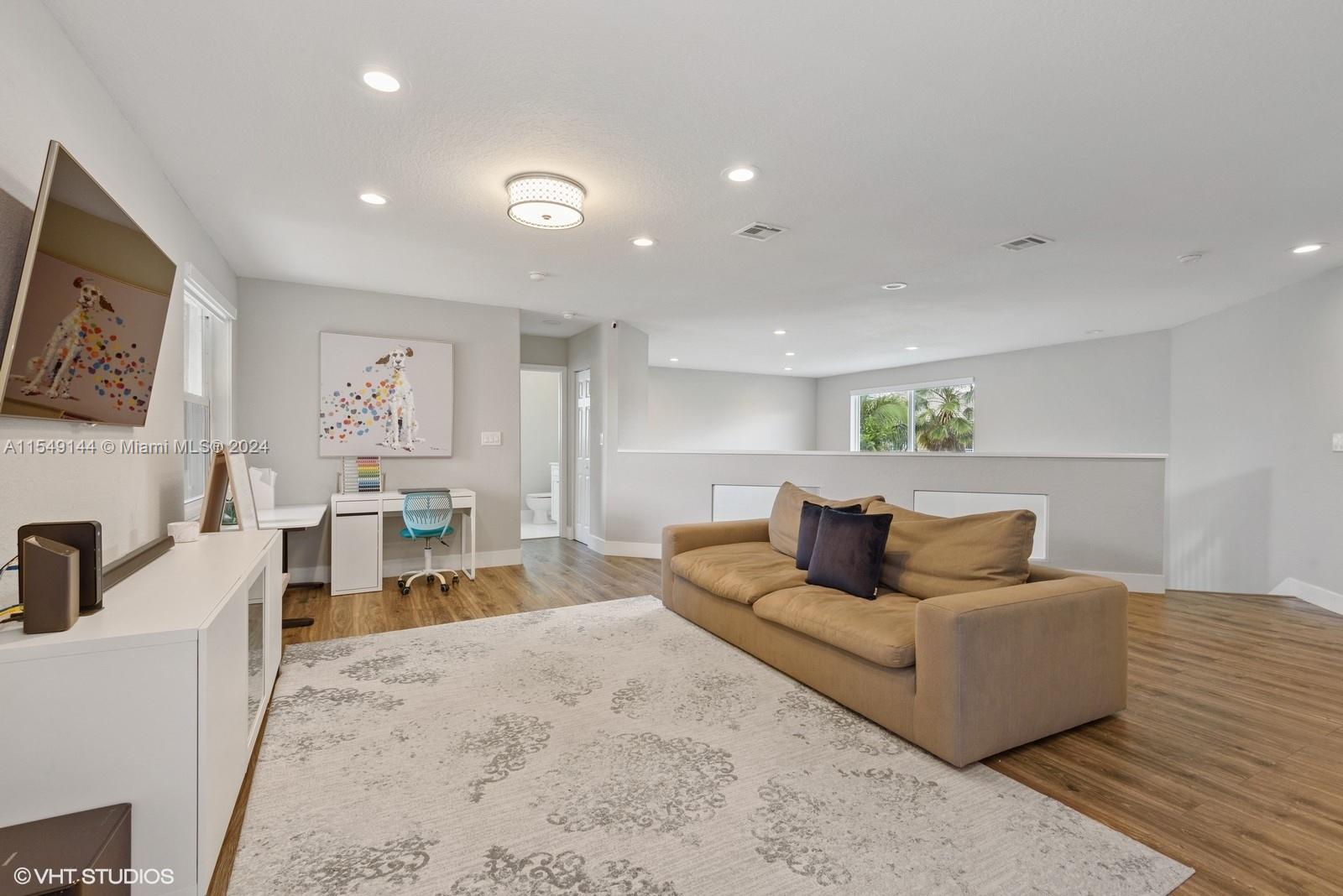 Upstairs family room loft area by bedrooms
