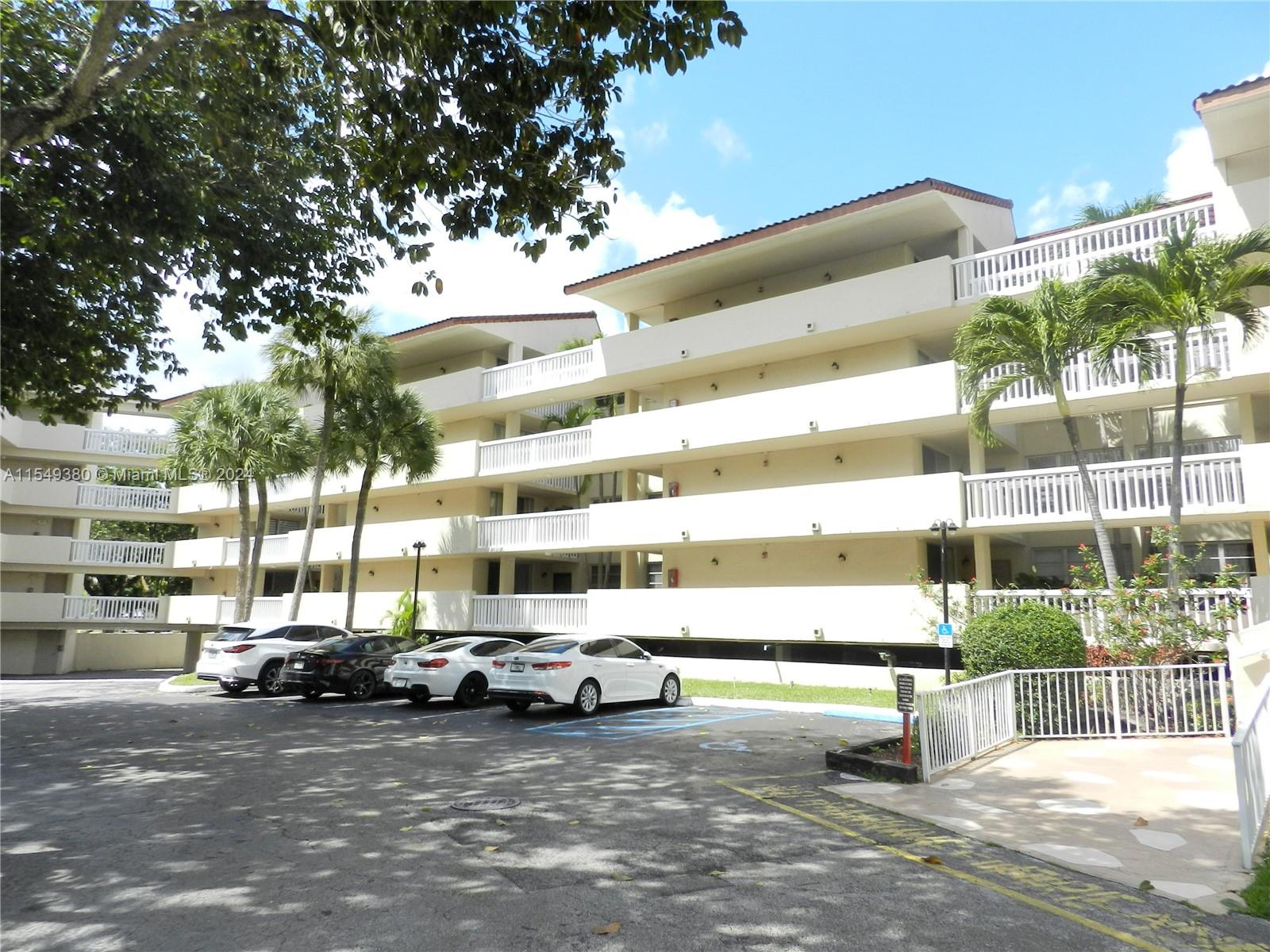 Beautifully maintained building nestled in a park-like setting