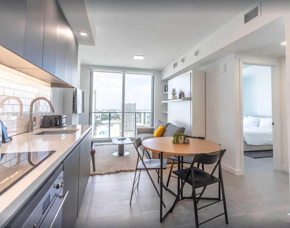 This furnished 1-bedroom, 1-bathroom unit is ideally situated in the vibrant heart of downtown Miami. Boasting stainless steel appliances and modern furnishings, this chic residence offers both comfort and style. The building amenities include a stunning pool on the 15th floor with mesmerizing city views, an equipped gym for fitness enthusiasts, and an array of dining options including restaurants, bars, and lounges. Don't miss out on the chance to own a piece of urban luxury in one of Miami's most sought-after locations. Invest wisely and schedule your viewing today!