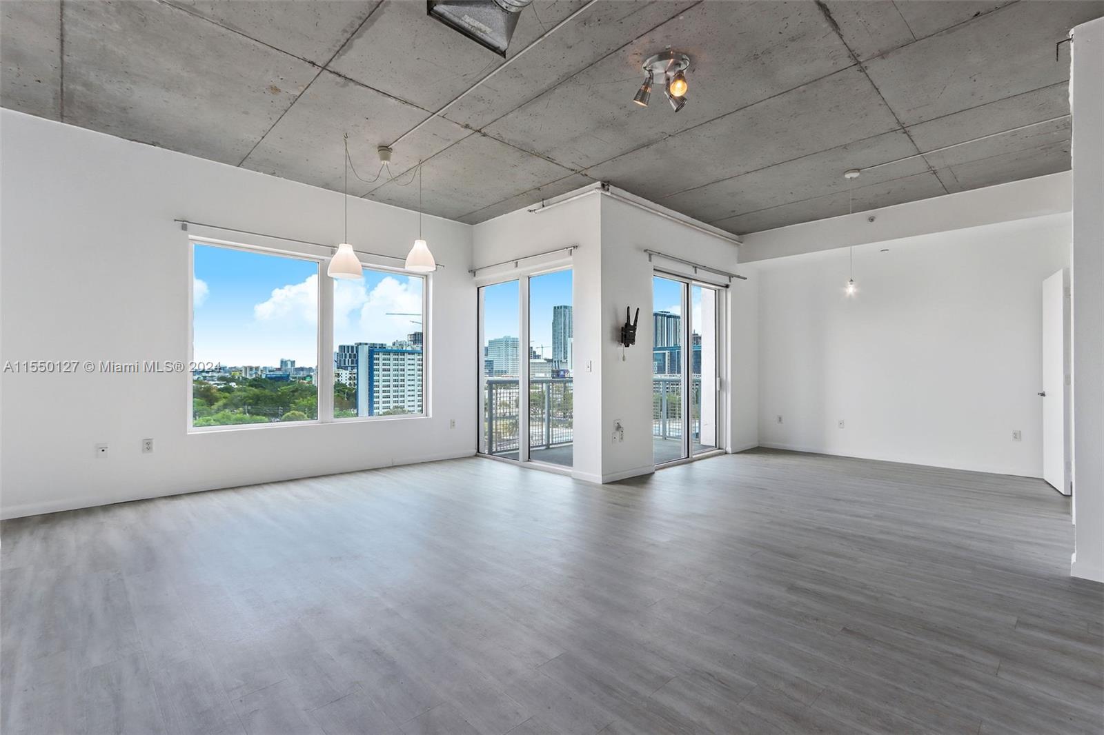 Open 1-bedroom loft in Historic Riverside overlooking Historic Miami River district overlooking the Miami River. The interior comprises over 700 SF of living space with laminate wood and tile flooring throughout, offering a spacious open kitchen and living area. Includes 1 assigned parking space and additional outdoor storage. Central to Downtown Miami, Little Havana, Coconut Grove, and Brickell City Center with direct access to I-95. Amenities include a gym, infinity-edge lap pool, sauna, tennis court, meditation garden, dog park, clubhouse, business center, and gourmet Spanish restaurant Jamon Iberico Pata Negra, 24-hour concierge and valet.