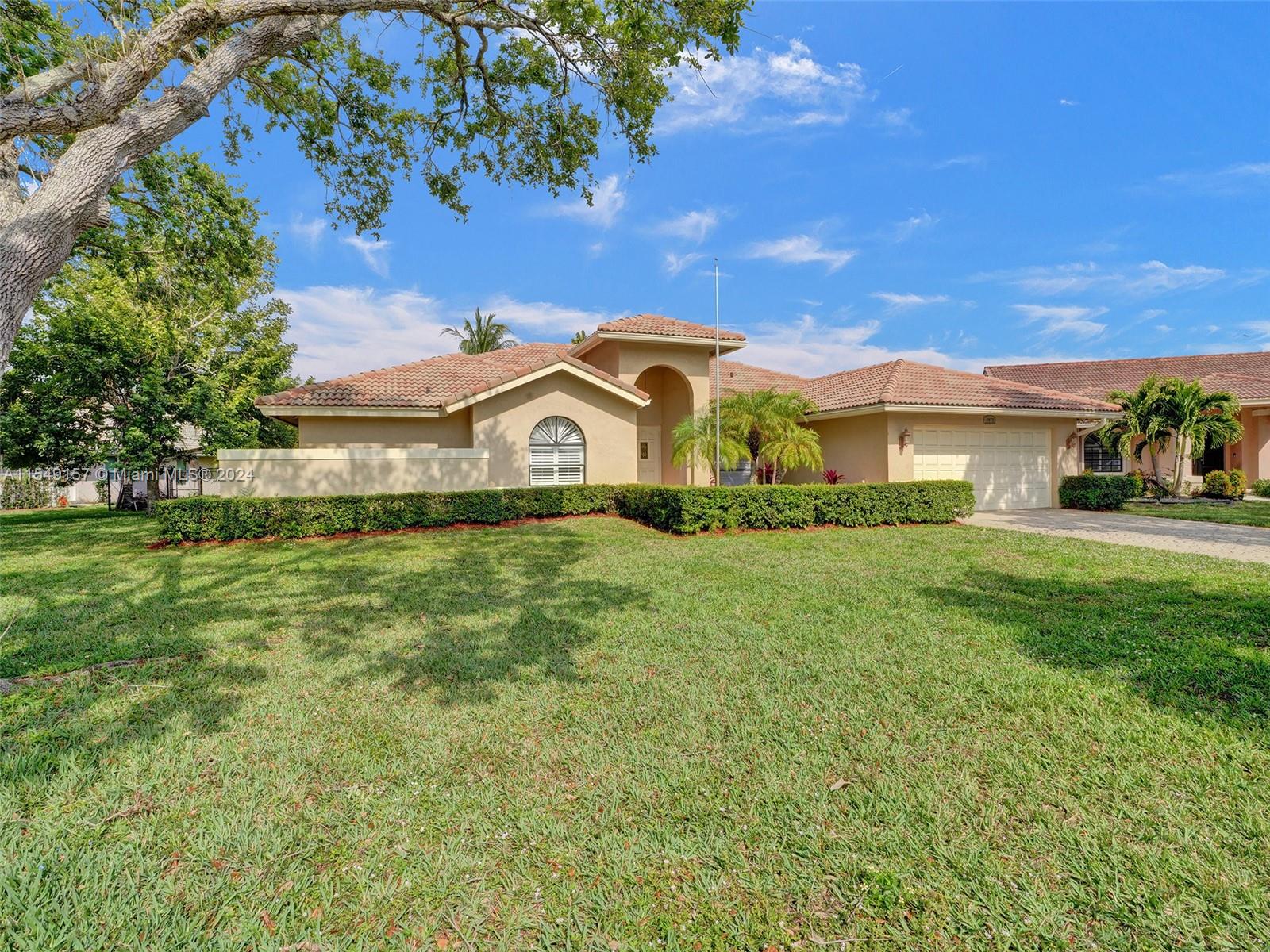 9077 NW 52nd Ct, Coral Springs, FL 33067