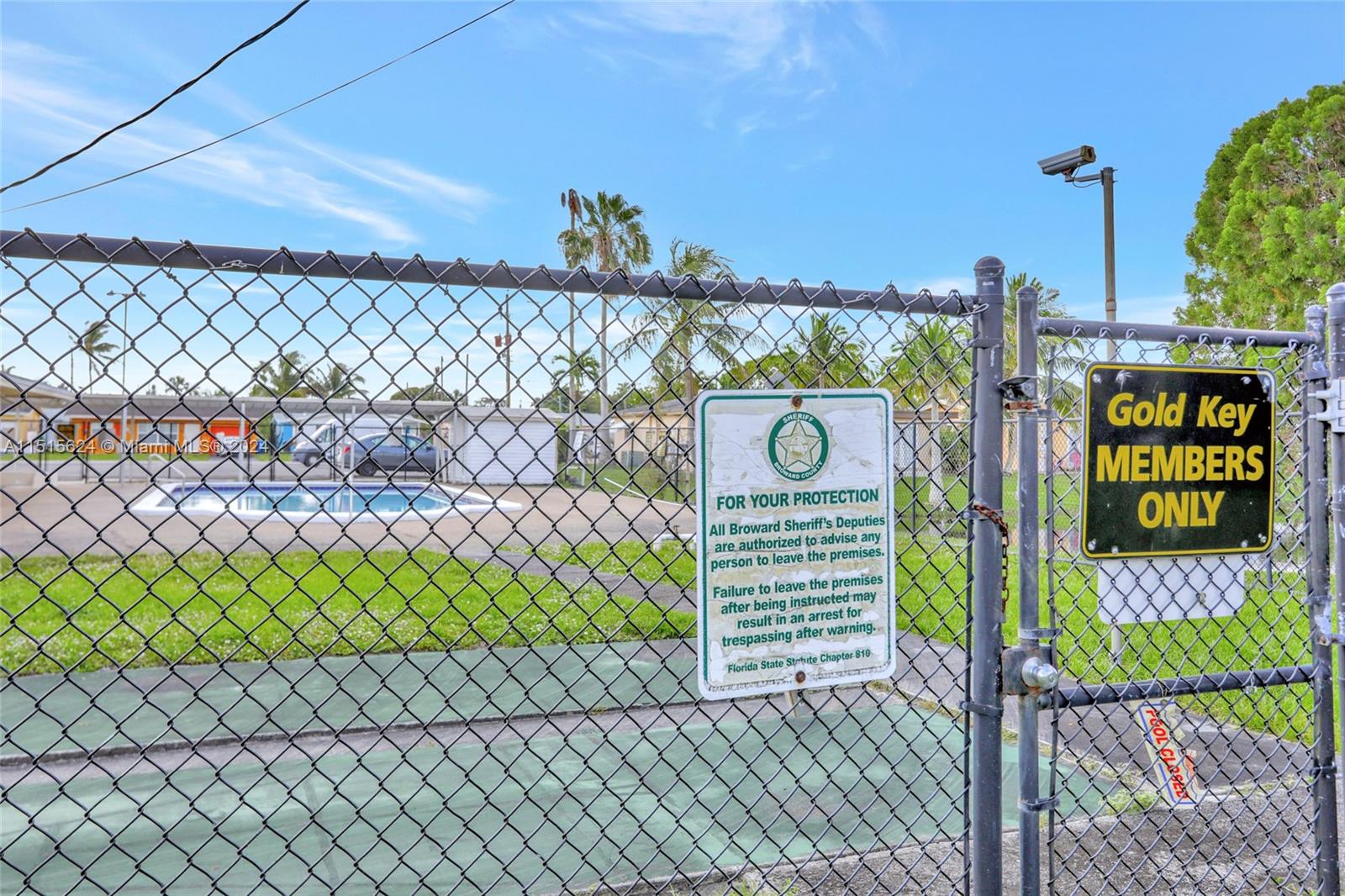 Fence around community pool & clubhouse restrict non-members from accessing facilities.