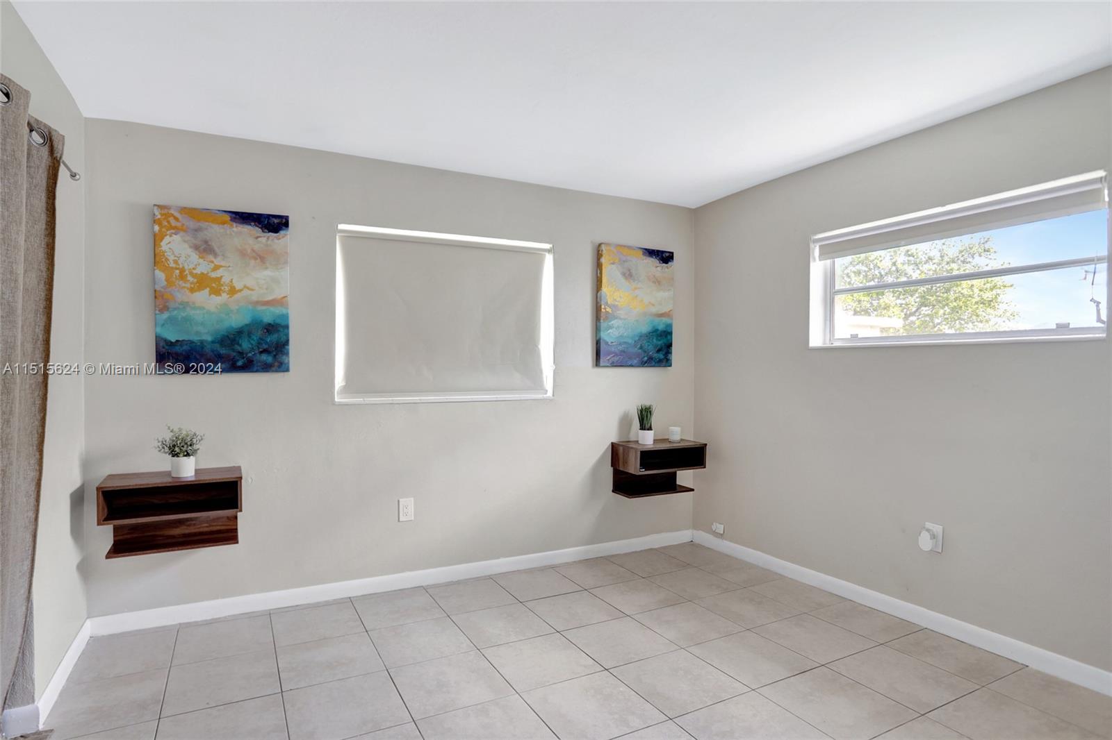 Primary bedroom without any furniture.