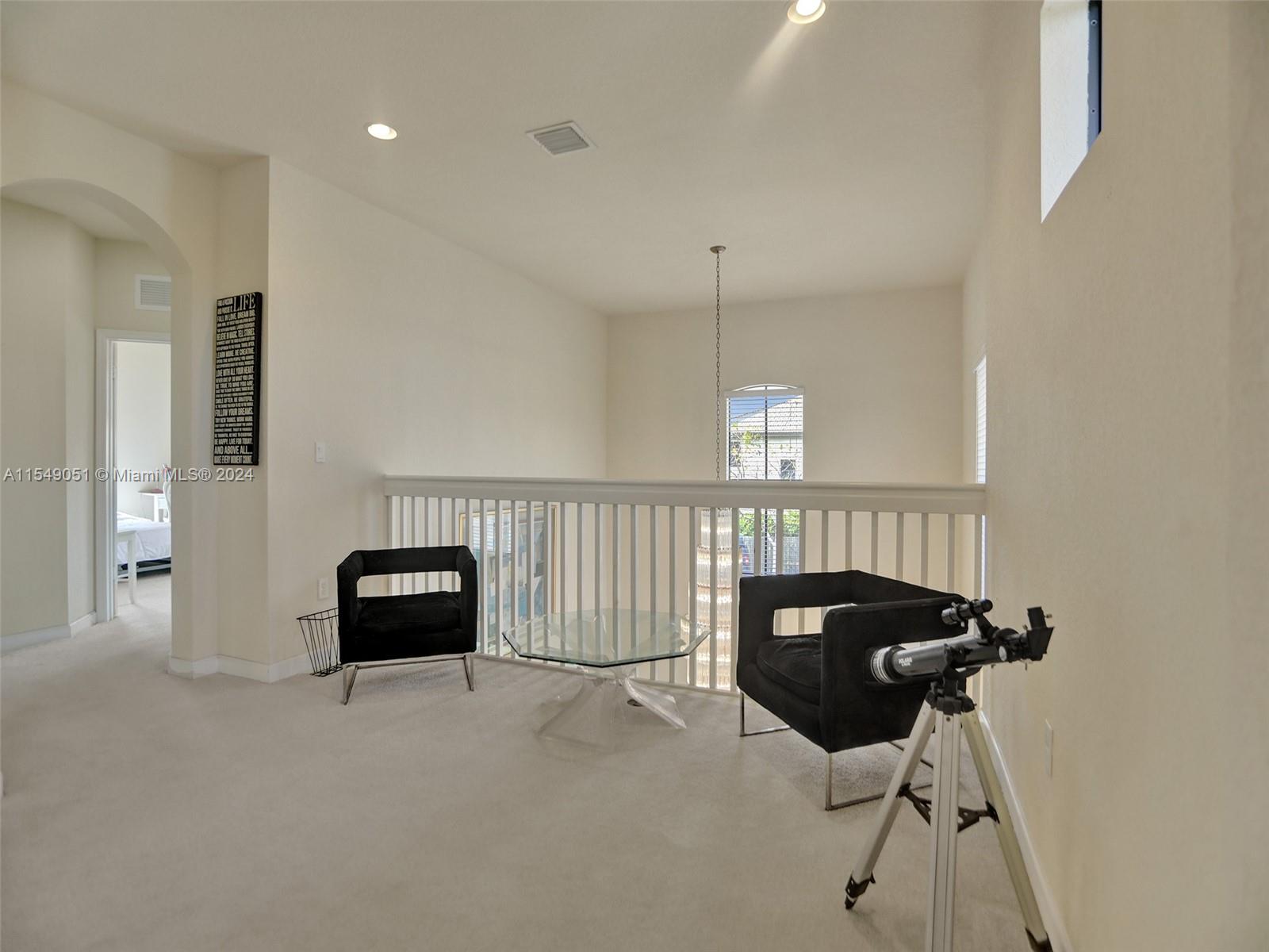 Loft that over looks dining area.