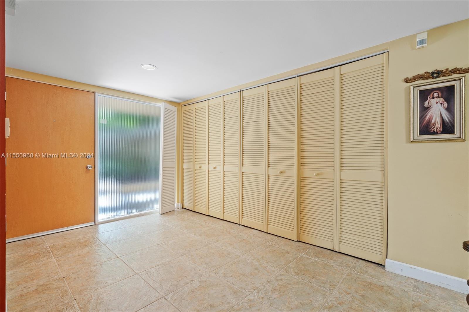 Foyer with closets for storage!