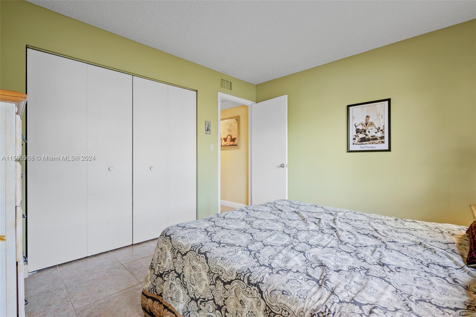 2nd bedroom with water view and door that leads to backyard!