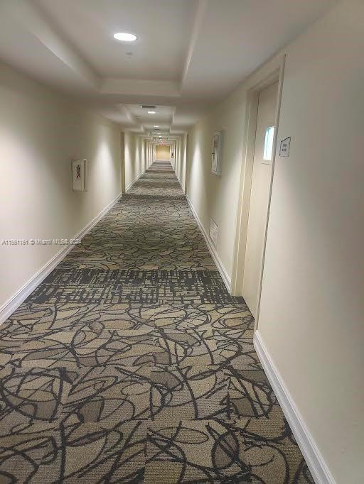Hallway leading to unit