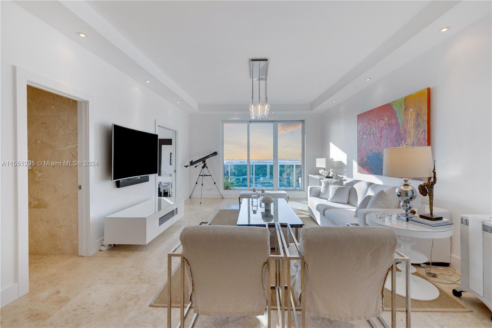 Step outside onto the extra large private terrace and experience an unparalleled panoramic view of the Miami skyline and breathtaking sunsets. Every hour of the day offers an amazing vista, from the vibrant cityscape during the day to the enchanting glow of the city lights at night. This expansive outdoor space provides the perfect setting for al fresco dining, entertaining guests, or simply unwinding while immersed in the beauty of Miami's skyline