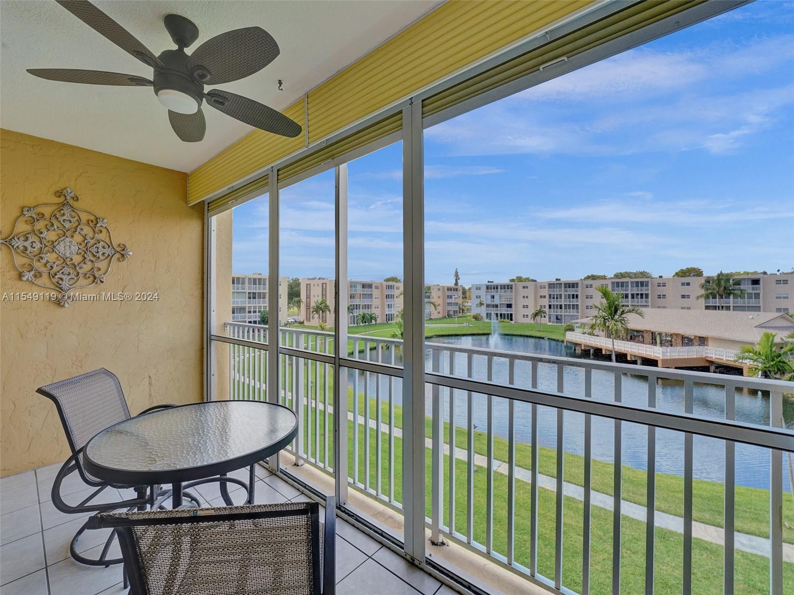 Screened & covered balcony with lake views!