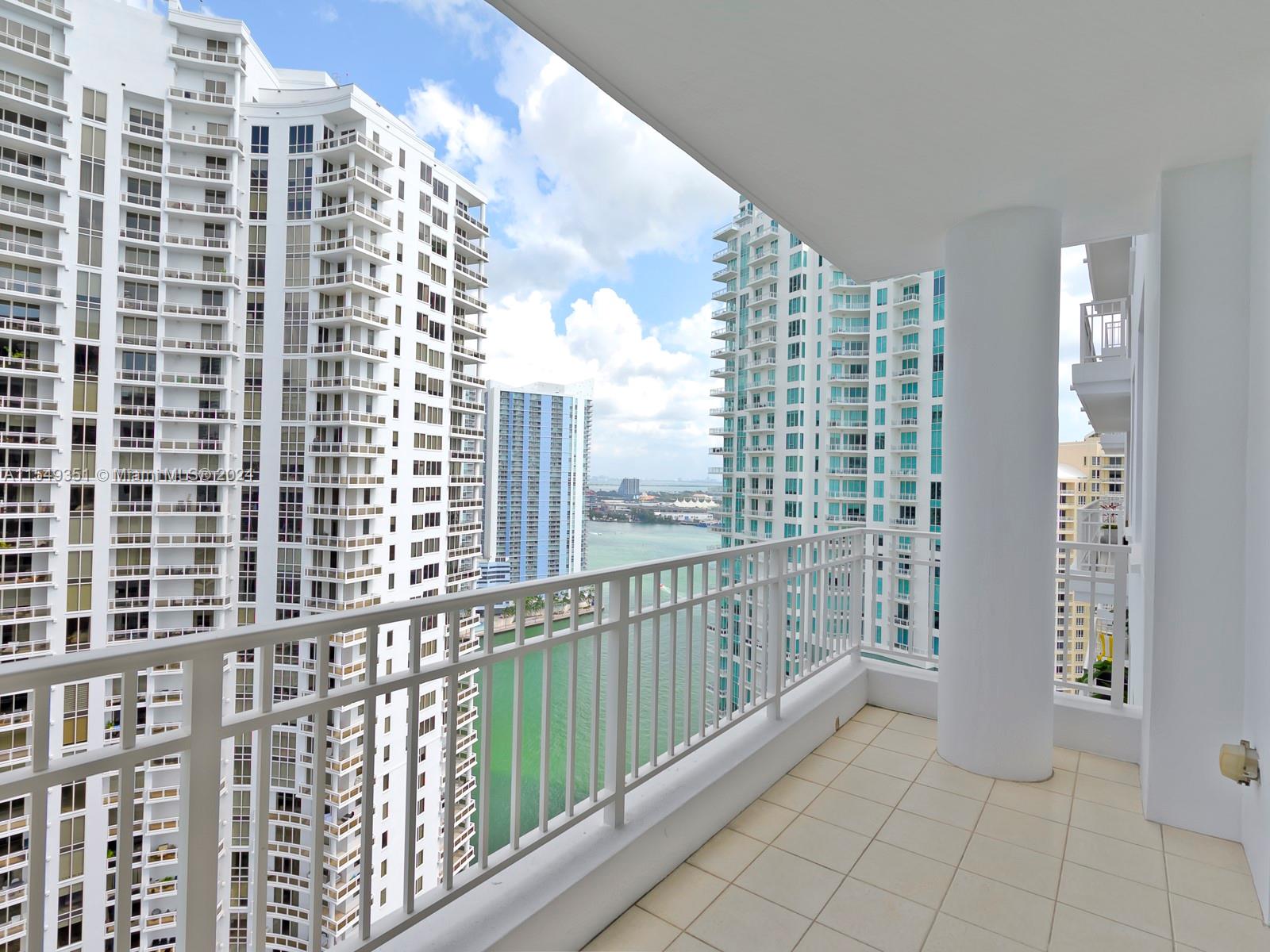 Enjoy the benefits of living at the prestigious Courts at Brickell Key. This spacious and bright 2-bedroom, 2.5-bathroom apartment features marble floors, RENOVATED KITCHEN, the largest balcony in the building, a master bedroom with a separate balcony, 2 assigned parking spaces, and storage. Building amenities include a pool, jacuzzi, gym, event hall, children's playroom, racquetball courts, bicycle storage, valet parking. This is a very convenient location in Miami, within walking distance to Brickell City Center, the Brickell Financial District, and all the restaurants and entertainment venues. Just minutes away from Miami International Airport, Coral Gables, Coconut Grove, Key Biscayne, and many other attractions