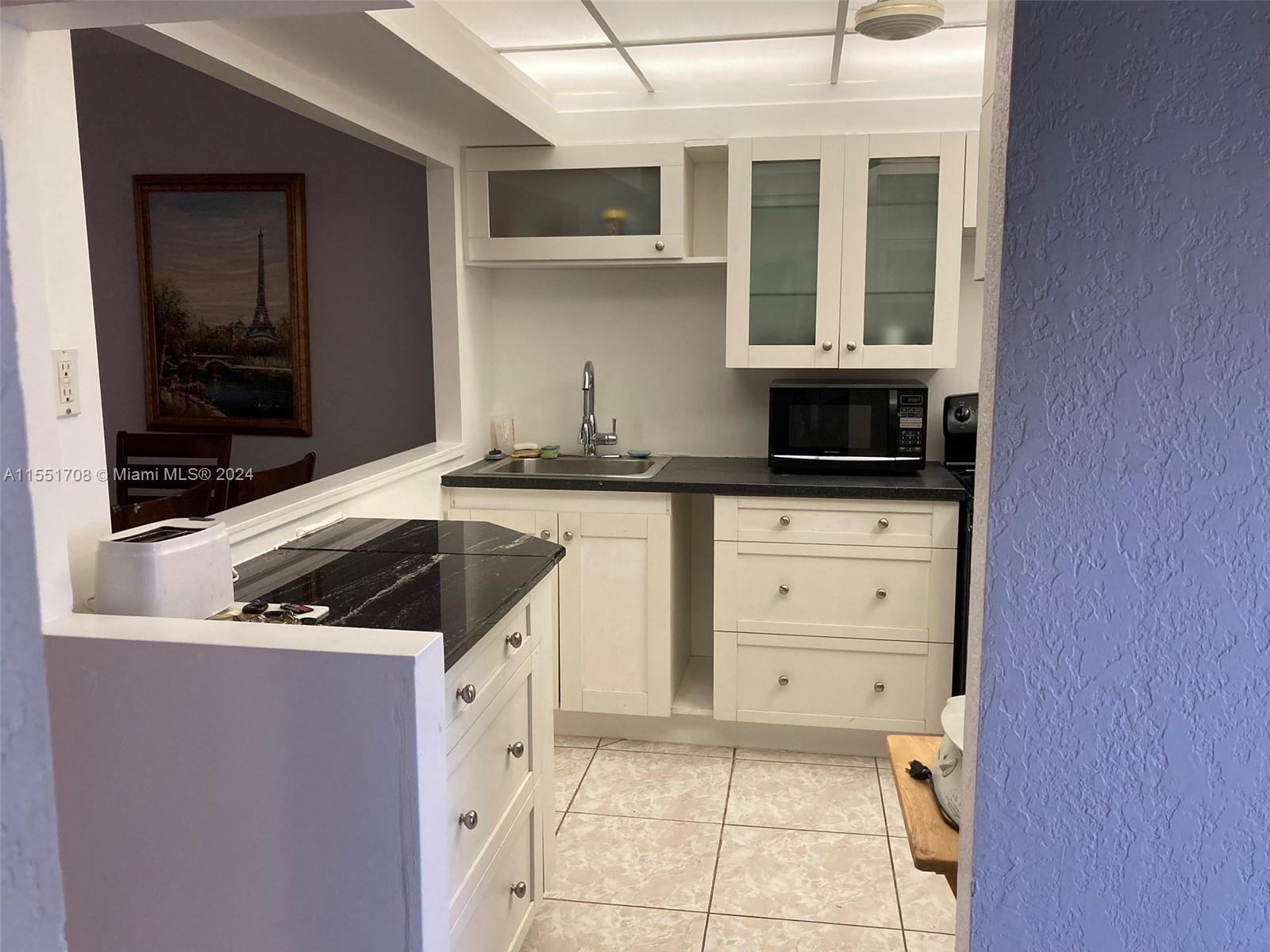 5111 Oakland Park Blvd, Lauderdale Lakes, FL, 33313 United States, 1 Bedroom Bedrooms, ,1 BathroomBathrooms,Residential,For Sale,Oakland Park Blvd,A11551708