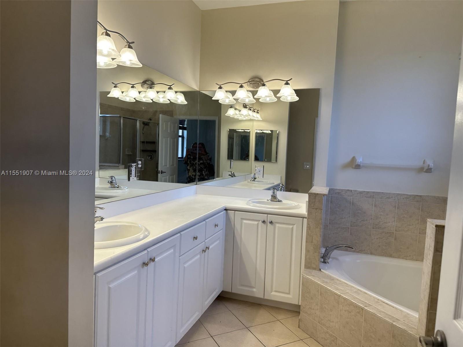 Full shower, dual sink and hottub