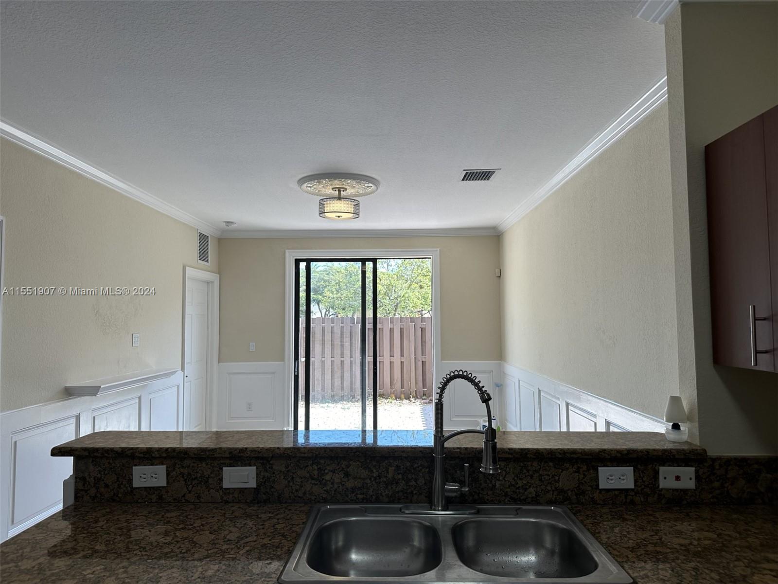Counter top in kitchen looking towards garden