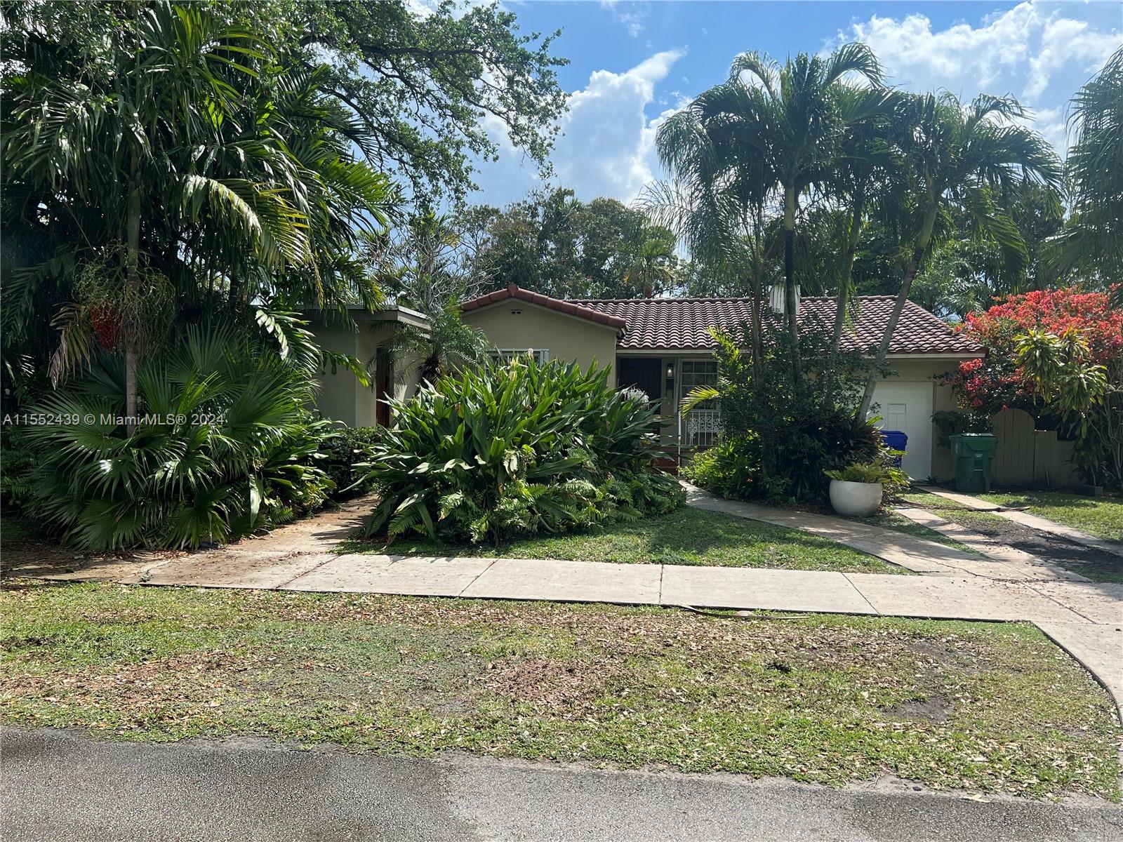 Quaint and cozy home in the heart of Miami. Walking distance to coral gables fine dining and entertainment. This property features 3 bedrooms with 2 bathrooms and a den. One bedroom/bathroom offers private entrance. Perfect for a family or investor. This home has two living areas, dining, kitchen and closed in garage for all your storage needs. Huge backyard with endless possibilities for pool or beautiful oasis. Large mature avocado tree on property. Don't miss your chance to move into this gem of a neighborhood!