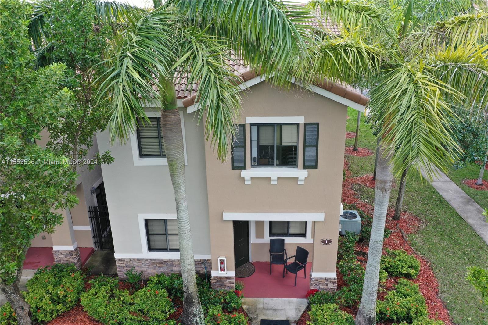 Charming corner townhouse/condo with a garden front in The Courts at the Isles of Bayshore, Cutler Bay.3 bedrooms, 2.5 bathrooms. Bedrooms upstairs with a practical split floor plan. Spacious kitchen, a generously sized master bedroom featuring a walk-in closet. Garden view. The convenience of a washer and dryer is available on the first floor. The unit comes with 1 assigned parking space and ample guest parking for the second resident. Enjoy the resort-style community with swimming pool, two clubhouses, a fitness center, a children's play area, and 24-hour security. It is within walking distance to schools, close to Black Point Marina, restaurants, and shopping centers. Plus, it's a pet-friendly community.