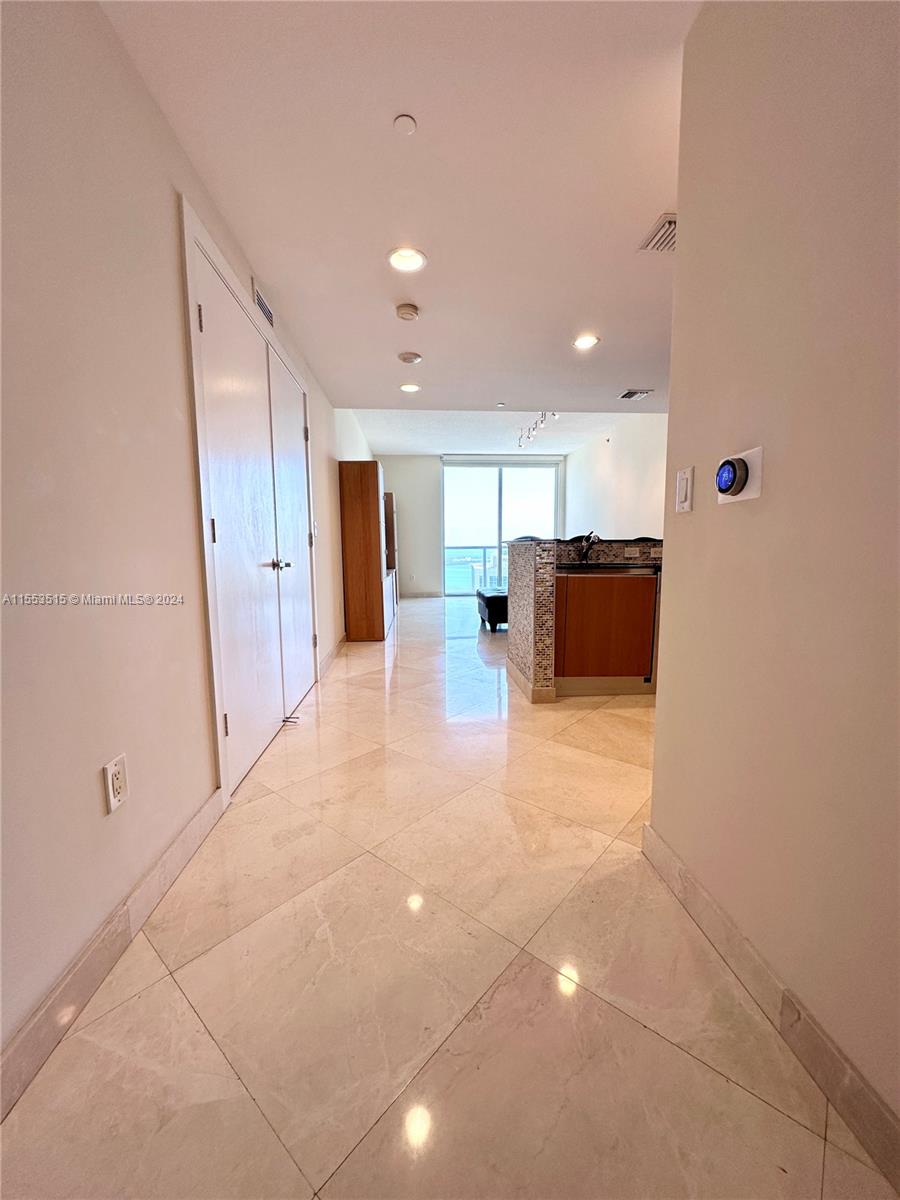 Spectacular 2 bed 2 bath corner unit in best location of Brickell Area with breathtaking water and city views. Unit features, beautiful 24 X 24 marble floors throughout; utility/ laundry room with LG large capacity washer and dryer; windows treatment both screens & blackouts throughout, buildout closets throughout; Nest thermostat; 1 assigned parking space, BOSCH stainless steel appliances & Italian design Kitchen with granite countertops and much more!. Building offers great amenities, building is walking distance from many restaurants, supermarkets, Mary Brickell Village; Miami Brickell City Center, people mover and metro rail stations. Unit is vacant and ready to move in!!. This unit is partially furnished.