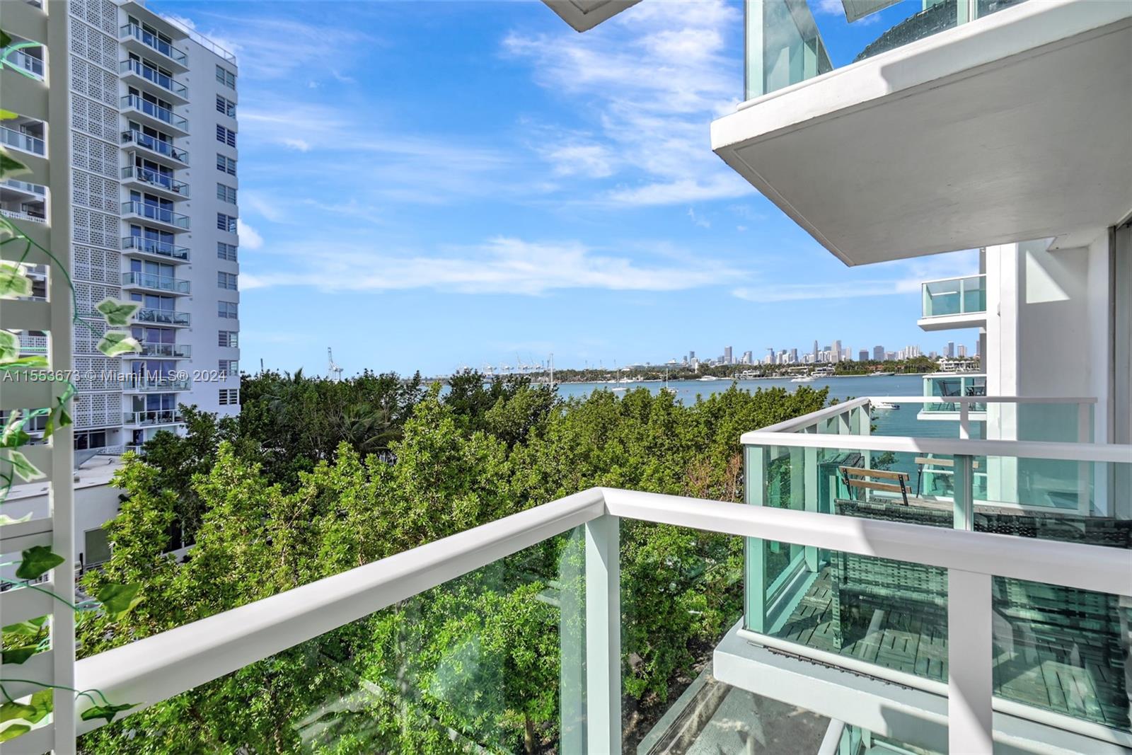 Indulge in luxury with this fully renovated bay view condo. No detail spared, featuring high-end finishes, custom cabinetry, Impact Windows & doors, and in-unit washer & dryer. Take in the breathtaking bay views from the balcony. The full-service building offers a renovated bayfront pool, 3,000 sq ft gym, 24/7 security, convenience store, and more. Centrally located in Miami Beach, with Whole Foods, restaurants, and stores nearby.