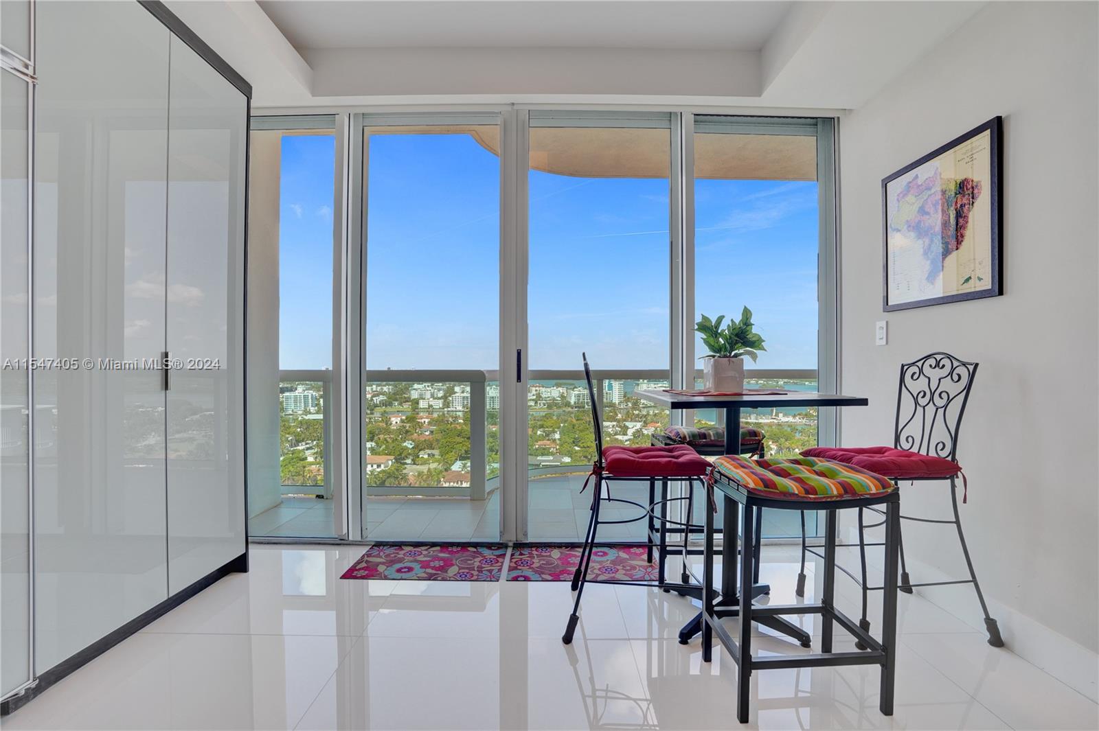 Elegant and wide living room integrated with dining and grill area.