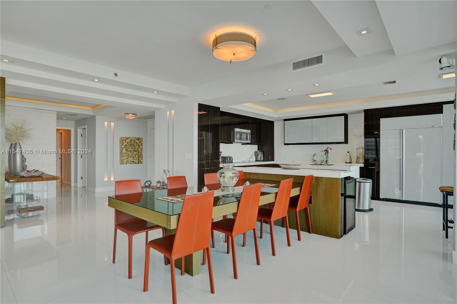 Modern, clean and spacious kitchen with island and breakfast area.