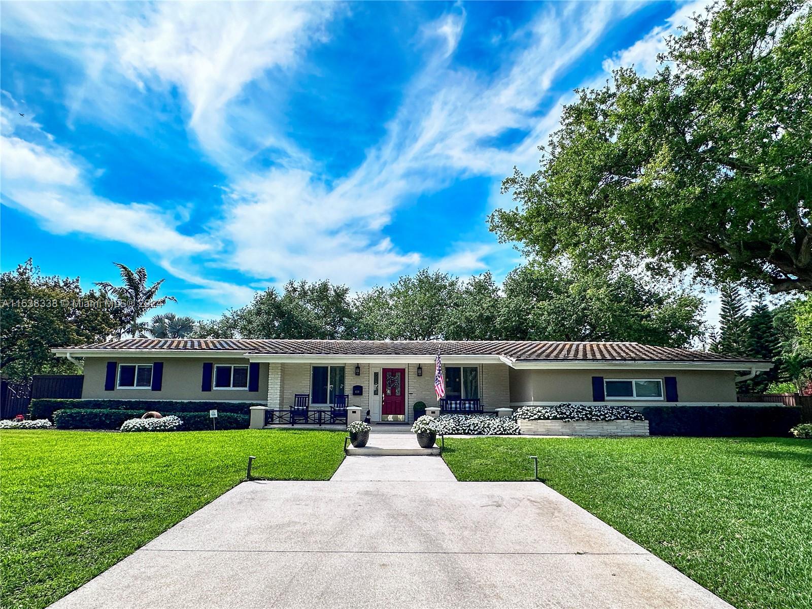 Welcome to your dream home in the quaint neighborhood of Mangowood in Palmetto Bay. This 4-bed, 3-bath boasts a spacious yard with a pool, hot tub & captivating outdoor kitchen, perfect for entertaining or unwinding. The foyer leads into the spacious living area overlooking the backyard. The updated kitchen is equipped with stainless steel appliances, induction cooktop, ample storage space & a breakfast nook. The master suite features a private en-suite bathroom, spa-like shower & dual vanity. 2 additional bedrooms offer comfort with ample closet space. The 4th bedroom was converted into an office/den with custom built-in desks & storage. The 2-car garage was partially converted to laundry/pantry. Upgrades include: LP Cummins Generator (full house), PVC plumbing & impact windows and doors.