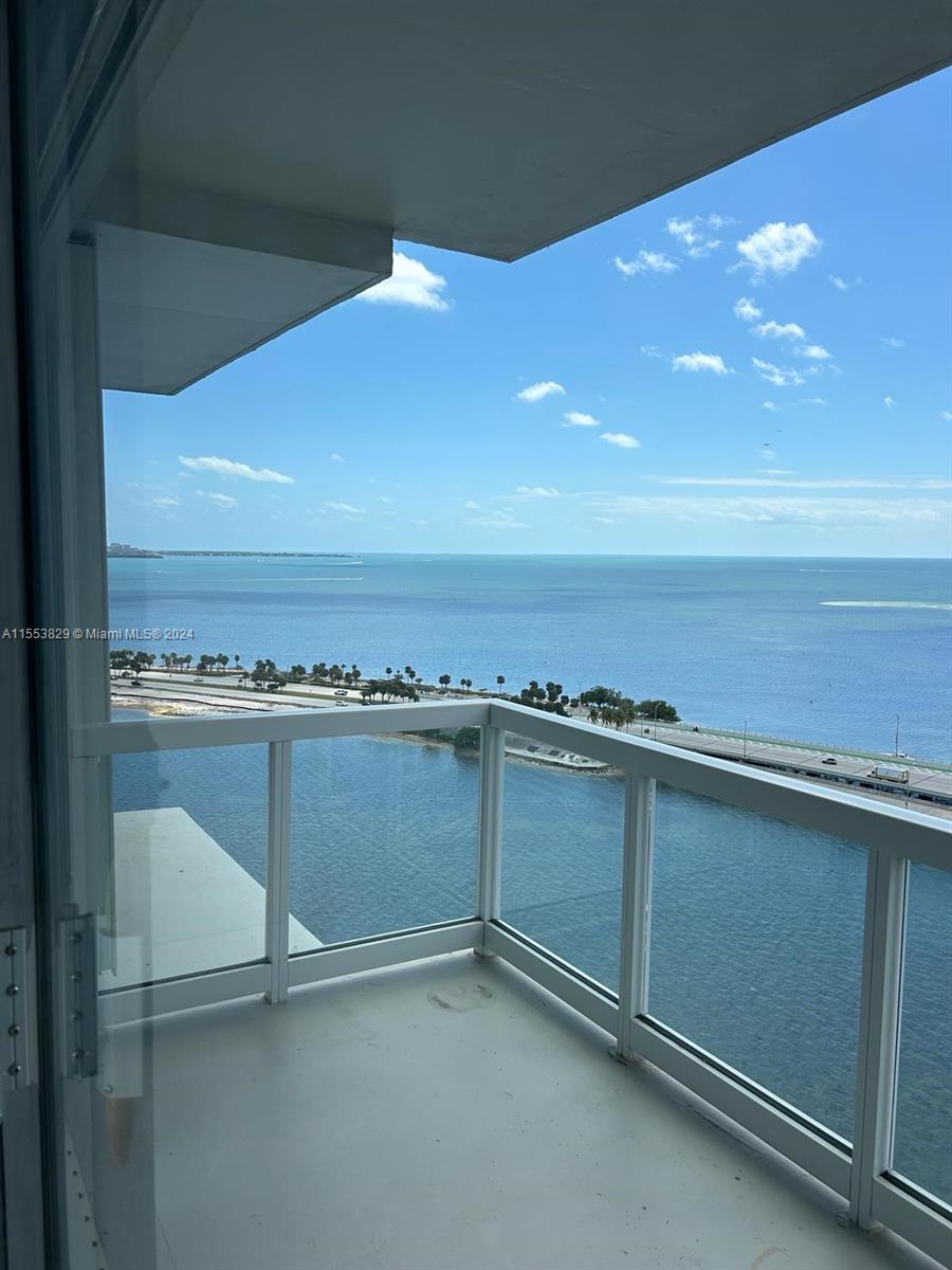 large unit with spectacular water views, remodeled kitchen, central AC and heater, in unit washer and drier, floor to ceiling glass and more and more.
