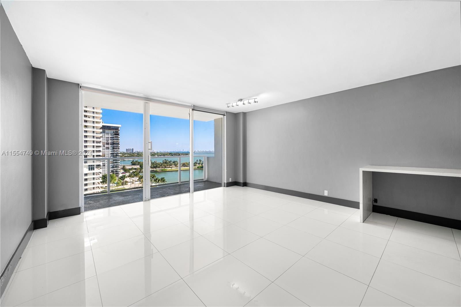 BEAUTIFULLY REMODELED WATERFRONT STUDIO WITH BREATHTAKING VIEWS OF BISCAYNE BAY IN THE HEART OF EDGEWATER NEIGHBORHOOD IN MIAMI. WITHIN WALKING DISTANCE TO MIAMI DESIGN DISTRICT, MIDTOWN, WYNWOOD, ONLY A BRIDGE AWAY FROM MIAMI BEACH, AND CONVENIENTLY LOCATED WITHIN THREE BLOCKS OF THE HIGHWAY ACCESS. UPDATED WITH STAINLESS STEEL APPLIANCES, KITCHEN WITH ITALIAN CARRARA QUARTZ COUNTER TOP AND EURO CABINETS, REMODELED BATHROOM, SPACIOUS BALCONY WITH BAY VIEWS. AMENITIES INCLUDE A HEATED POOL, PRIVATE DOG PARK, GYM, MANAGEMENT ON SITE, BEACH CABANA, DOCK, BBQ AREA, LOUNGE/GAME ROOM, TENNIS COURT. INCLUDED IN RENT ARE: 1 ASSIGNED PARKING SPACE, WATER, SEWER.