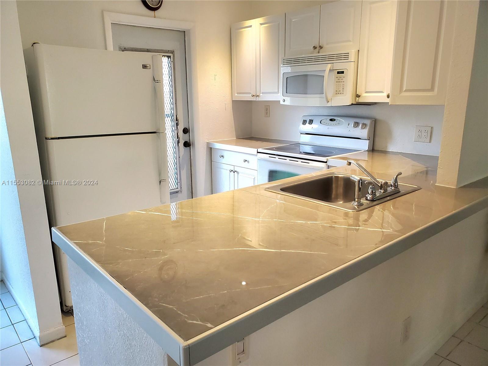 5171 W Oakland Park Blvd 101, Lauderdale Lakes, Florida 33313, 2 Bedrooms Bedrooms, ,2 BathroomsBathrooms,Residential,For Sale,5171 W Oakland Park Blvd 101,A11553082