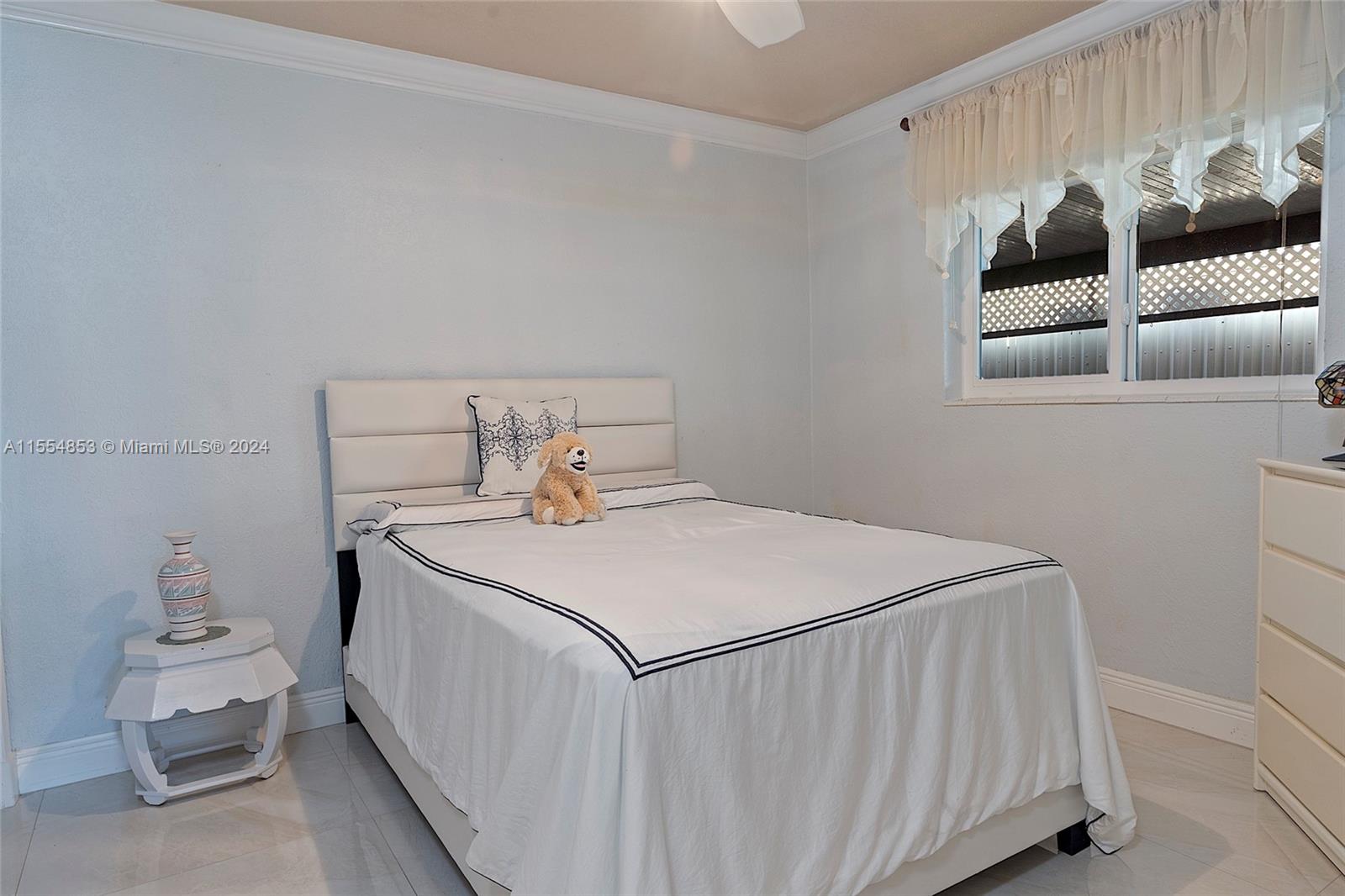 Enclosed Patio with Outdoor Tiles and Built-in Bar