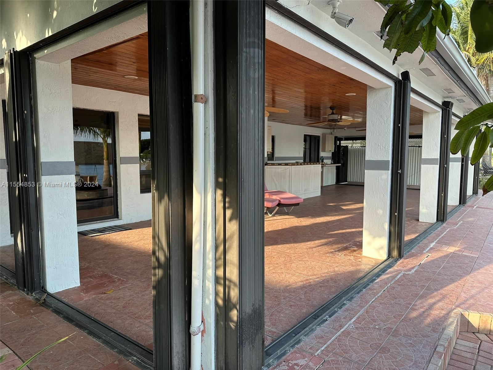 Backyard with Pool, Pavers, Gazebo with Grill, Trees, Dock, Ramp and Sun Deck