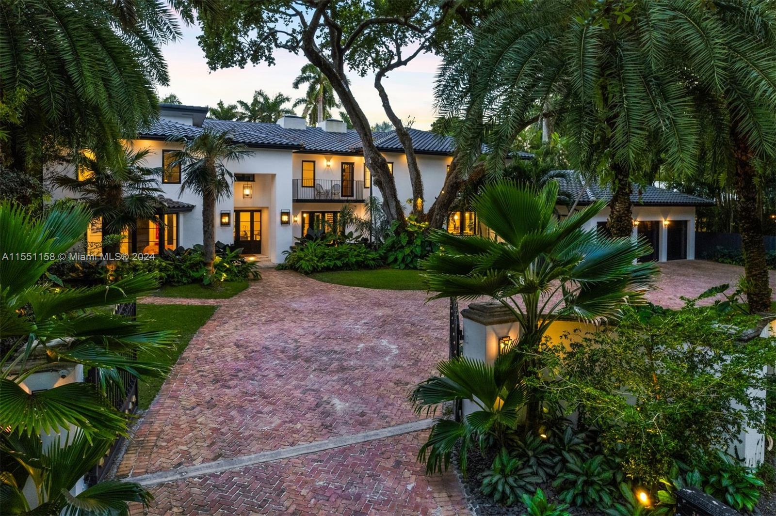 Completely renovated in 2022, the stunning 7,599 SF estate is tucked away on Leafy Way, a quiet private road in highly sought-after South Coconut Grove. With 20,125 SF of lush tropical grounds, the property presents a serene oasis with optimal privacy and gated entry. The 4-BD, 5.5-BA residence showcases spectacular light-filled living spaces featuring double-height ceilings, premium finishes, and high-end fixtures, epitomizing luxury living. A gourmet kitchen features floor-to-ceiling cabinetry, expansive center island, and top-of-the-line appliances. The beautiful backyard includes a summer kitchen and heated pool with waterfall jacuzzi. Additional features include a new roof, whole house generator, Savant smart home system, impact windows/doors, and a 3-car garage with MyQ Smart doors.