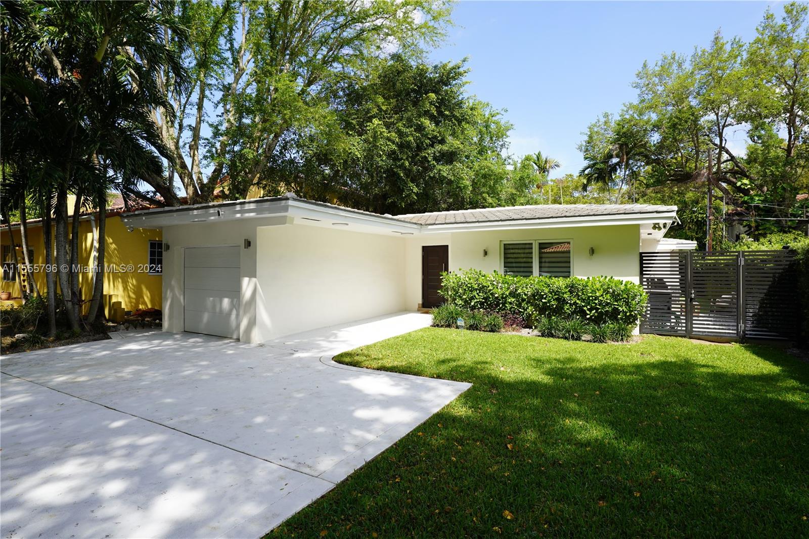 Live the Coral Gables lifestyle in this fully remodeled 3-bed, 2-bath Home with new roof replaced in January 2024 and Impact windows . From the inviting living spaces to the updated kitchen and bathrooms, every detail exudes quality and comfort. Step inside to discover a thoughtfully designed Home with an emphasis on both style and functionality. The open-concept layout creates a seamless flow from the living room to the dining area and kitchen, ideal for both everyday living and entertaining guests. Retreat to the master suite. Two additional bedrooms provide plenty of room for family, guests, or a home office. Outside, you'll find a beautifully landscaped backyard, perfect for hosting a BBQ with friends or simply relaxing, this outdoor space will become your favorite spot to unwind.