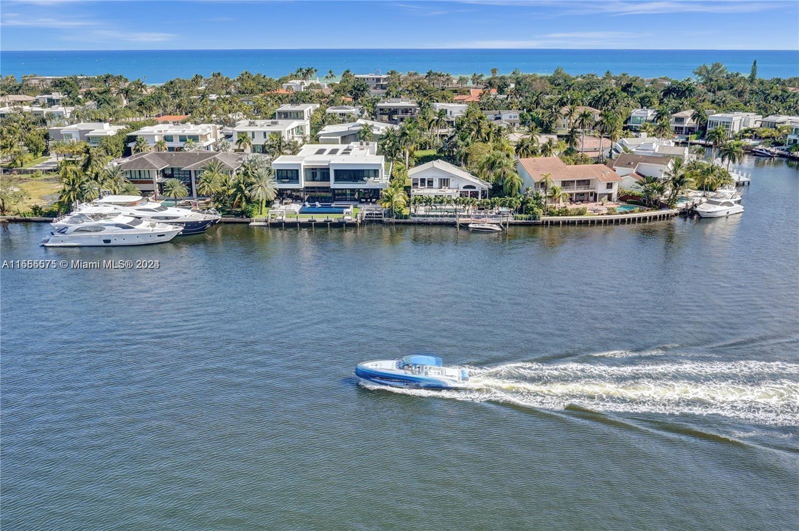 Step into this expansive, waterfront, flow-through unit with magnificent unobstructed Direct Ocean, Intracoastal & PGA Golf Course Views! This 3,000 SQ FT of luxury living space offers, a PRIVATE ELEVATOR, Enormous living room, Formal dining room, Open kitchen, Two spacious balconies, Custom built walk-in closet, Separate oversized laundry room w/extra full bathroom. Den is enclosed with double French door and is used as a third bedroom. Luxury style amenities include: Infinity Lap Pool, 100 Seat Movie Theater, 4 Tennis Courts, State-of-the-Art Fitness Center, Exclusive Restaurant, Internet Café, Kids room, BBQ, Elegant building lobby and concierge at the front desk. Just minutes to the beach, 3.5 mile walking and biking path, restaurants, shopping, major highways and Excellent Schools!