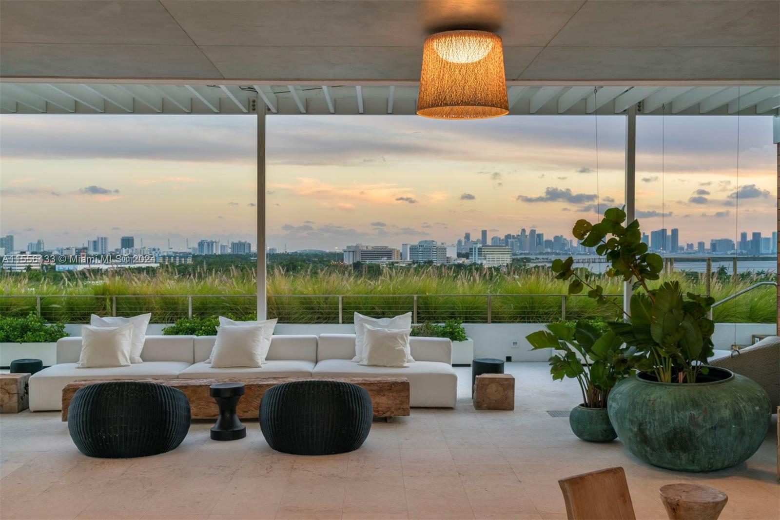 This turnkey penthouse features CEU Design + heirloom pieces in nearly 9,000 SF of indoor/outdoor living exuding the art of home. Full-time butler service. Open floorpan. 300+ degrees of unobstructed Miami & Biscayne Bay views. Private elevator entry into foyer. Floor-to-ceiling windows w/ natural light. 11” Oscar Ono wood floors throughout living areas & bedrooms. Custom Boffi kitchen + SS Gaggenau appliances. Primary suite features custom Salvatori Signature bathroom w/ bay views, Custom Porro closets & Fantini fixtures. Wraparound terraces perfect for entertaining w/ Ipe & teak wood flooring overlook the ocean, skyline & Biscayne Bay. Waterfront location including rooftop pool deck w/ cabanas & grille, lush meditation garden + hotel amenities, 2 parking spaces, storage & 40’ boat slip.