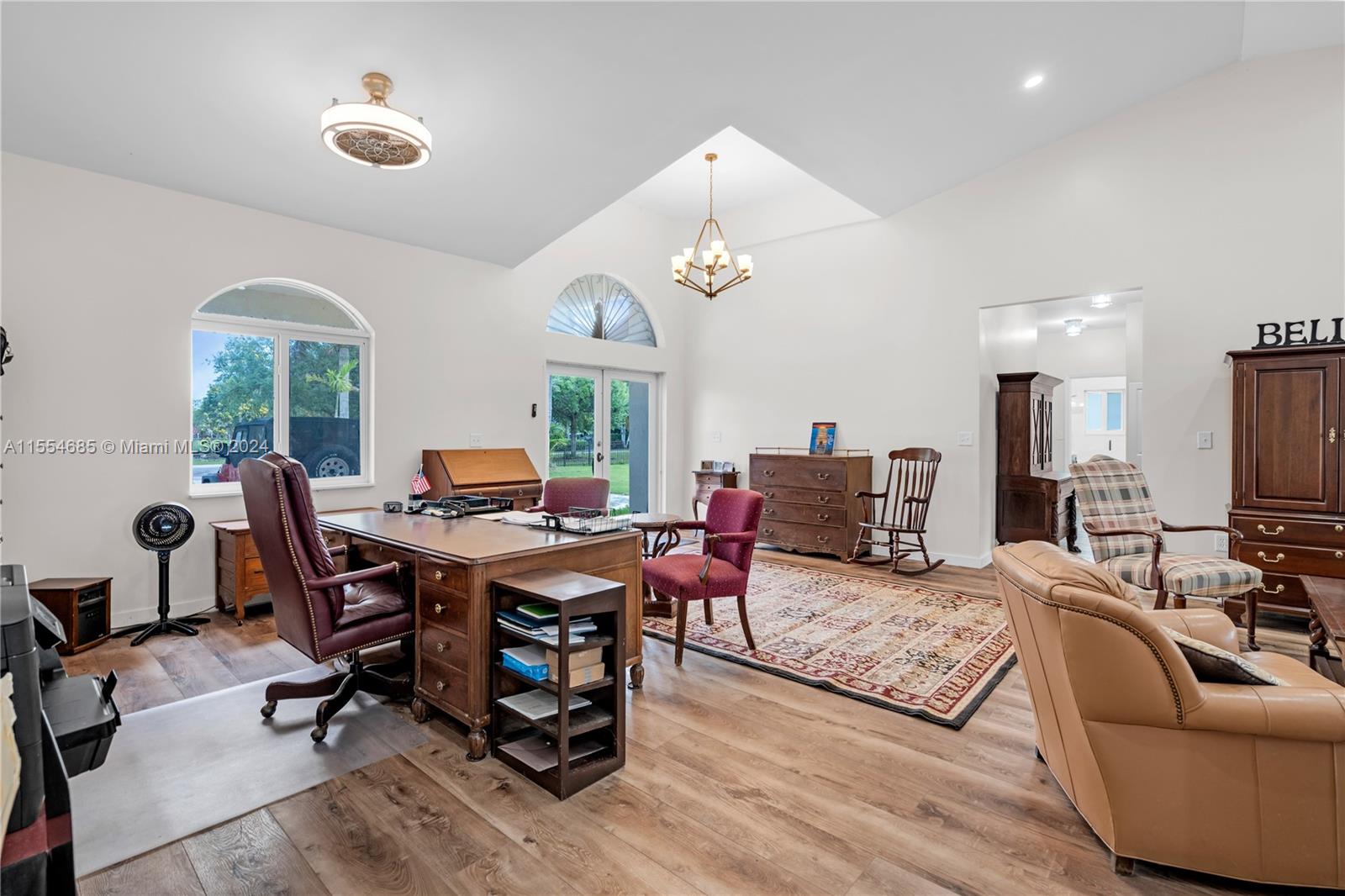 OPEN FLOOR PLAN - LIVING, FAMILY, DINING W/ VAULTED CEILINGS.