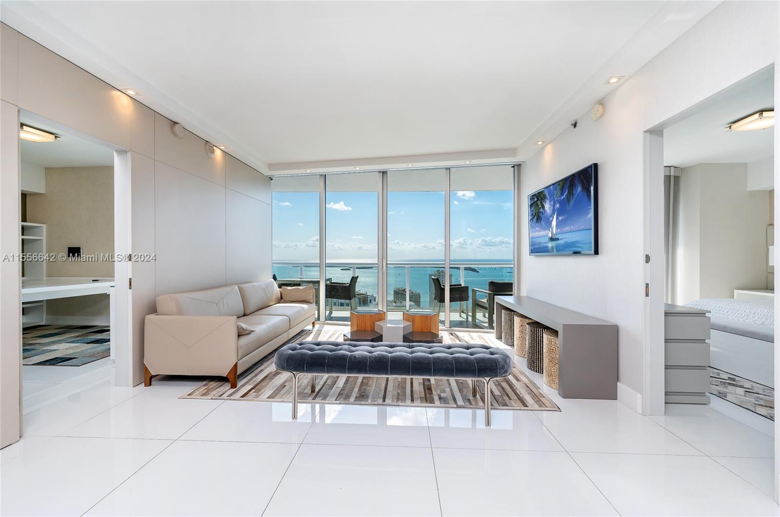 Welcome to the epitome of urban waterfront luxury living at Icon Brickell, where sophistication meets convenience. This stunning 2-bedroom, 2-bathroom, complete with a den,
offers captivating direct Biscayne Bay views and boasts gorgeous sunrise vistas. Meticulously updated throughout, this unit exemplifies modern luxury and convenience. With a turn- key. fully furnished design, it offer a seamless transition into you new home. Situated directly on the water. steps from world-class restaurants & vibrant Brickell living. 5- star amenities include fitness center, spa, pools, valet, & more. Don't miss your chance to own a piece of waterfront paradise in one of the most sought-after locations,.