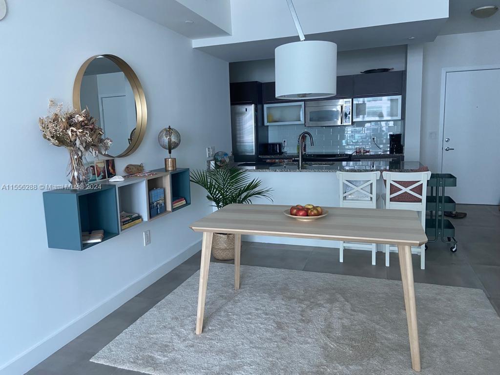 Dining Area and Kitchen with Furniture
