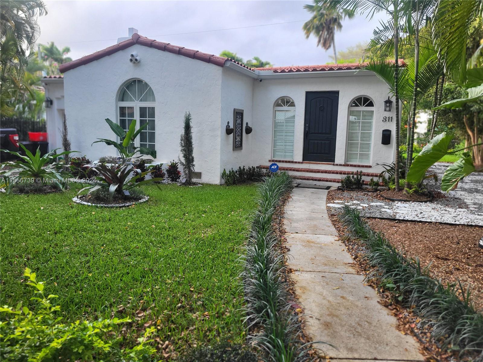 Step back in time to the charm and elegance of 1938 with this Classic Spanish home in the heart of Coral Gables. Conveniently located just a short walk from Merrick Park, Miracle Mile, and Coral Gables' finest restaurants, shops, and cultural attractions. Boasting original architectural details and recent modern updates, this timeless home offers a perfect blend of old-world character and contemporary comforts.  Embrace the allure of classic Spanish architecture with features such as a cozy fireplace, beamed ceilings, and original refinished hardwood floors as well impact windows and doors and exterior resurfacing. This home has been updated to modernize the kitchen and bathrooms with classic finishes.