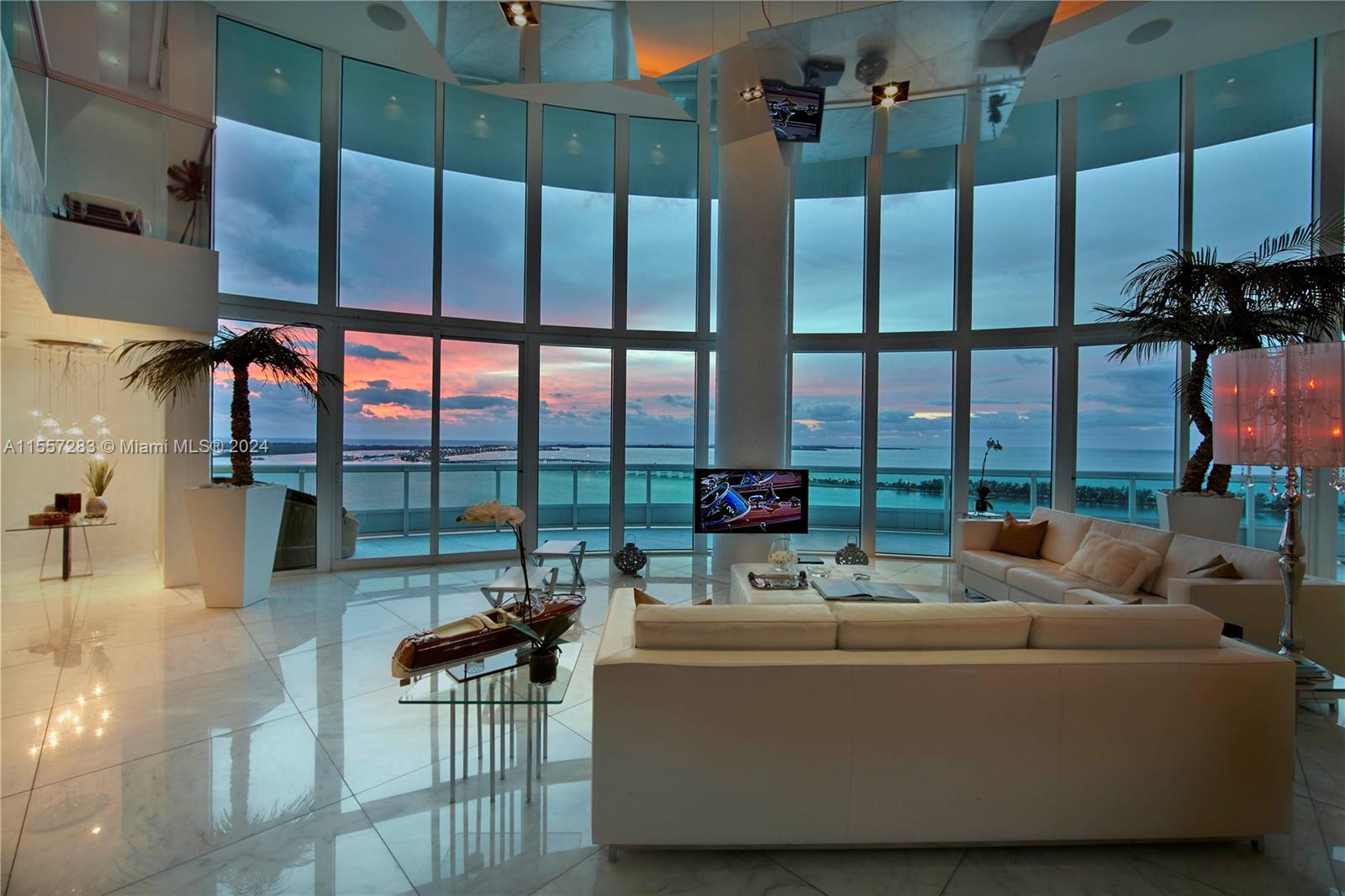 Modern and elegant 2 story unit with double height ceiling at Santa Maria in Brickell. 4BR/4.5BA totaling 5,730 Sqft (532m2) of interior plus a wraparound Balcony. Unobstructed views overlooking direct Ocean, Downtown Skyline & Key Biscayne. Custom design detail includes a spacious living and dining area, entertaining space, lots of walking closets, marble interior finishes and floor to celling windows. Option to buy a private dock is available with this unit up to 90 ft yacht (a few options avail). 3 parking spaces. Amenities include a bay front pool, marina, fitness center in the sky, billiards, business center and a 6,000 Sqft clubhouse.