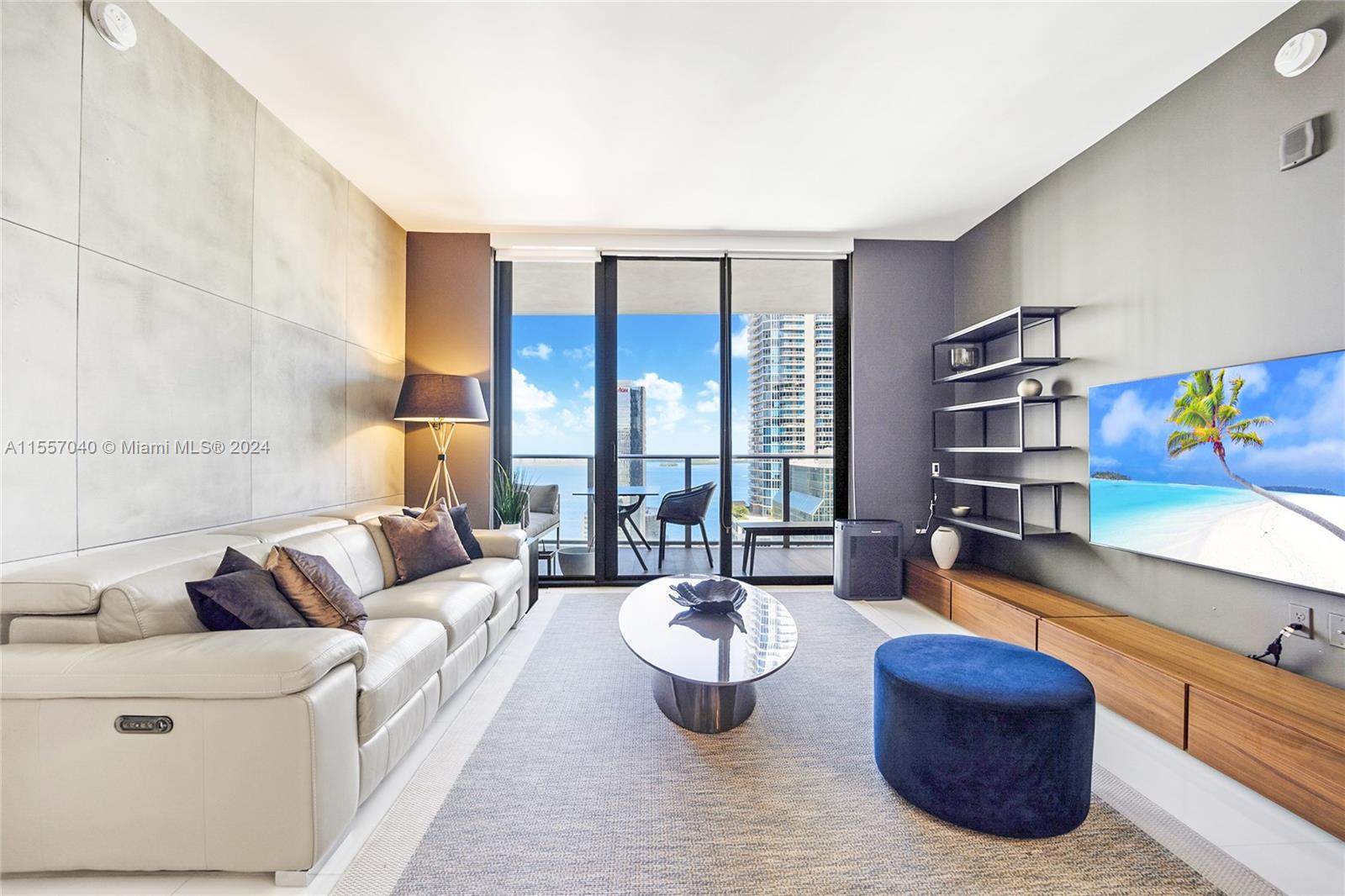 Spectacular 2 beds + den and 3 full baths unit with private elevator and panoramic view of the Miami Skyline and Bay. Building amenities include an indoor heated swimming pool, a full-service spa, roof top pool, kids playground and much more!