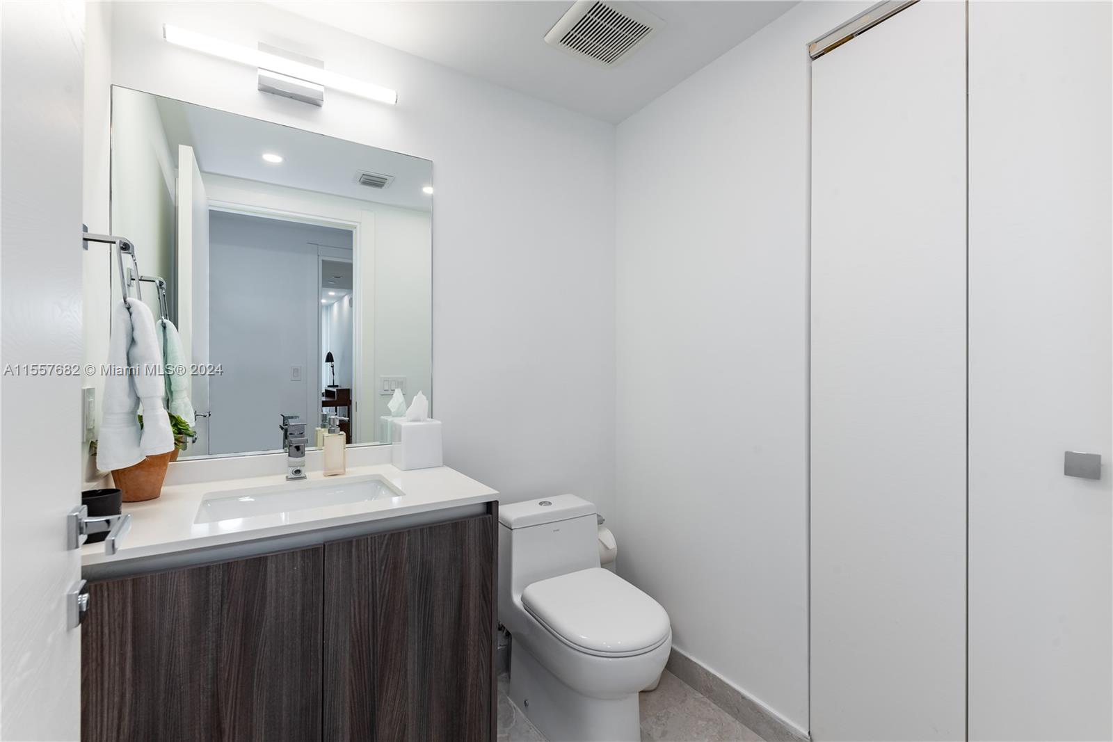 Half bathroom with Laundry room