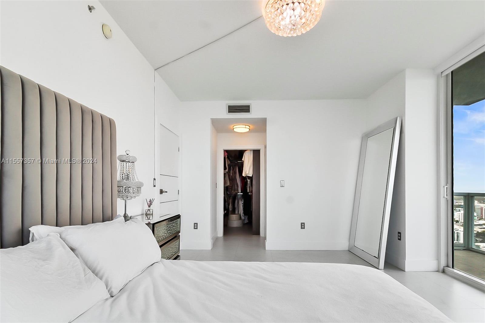 Master bedroom with walk in closet ensuite featured in the back ground