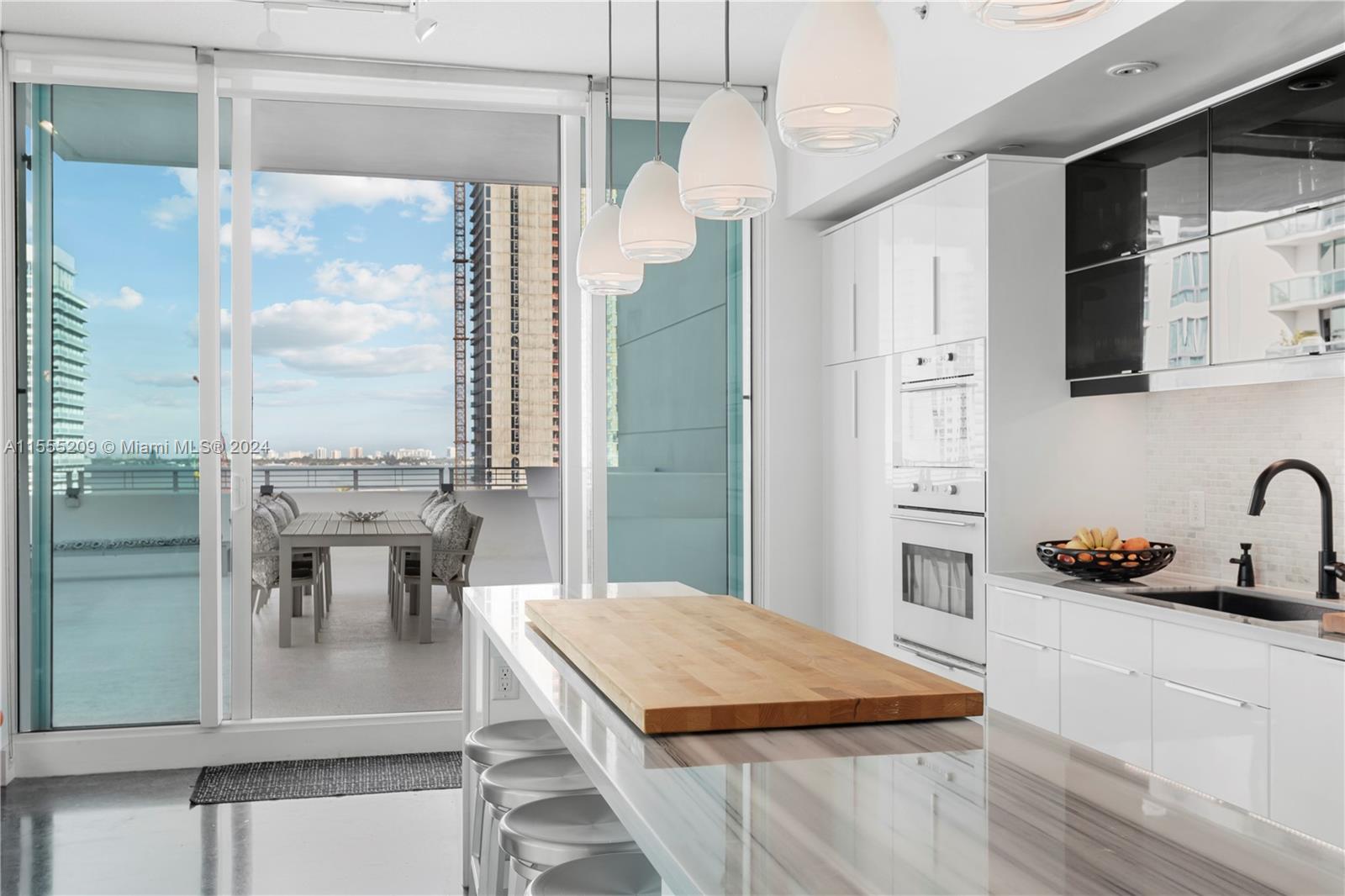 Discover unparalleled luxury living in this stunning 2 BD / 2 BA apartment in the heart of Biscayne Corridor. Enjoy breathtaking water views from the expansive 1,150+ SQ FT terrace. Features include polished concrete floors, floor-to-ceiling impact windows, and access to City 24 amenities such as secured lobby, gym, pool, sauna, yoga room, business center, billiard room, and party room. Pet-friendly with 2 assigned tandem parking spaces. Conveniently located near Design District, Wynwood, Midtown Miami, Performing Arts District, Brickell, beaches, Starbucks, Publix, and soon-to-open Whole Foods. Experience the epitome of urban luxury lifestyle.

Lease available until Dec 1st 2024 (Minimum lease term 3 months). Fully furnished apartment.