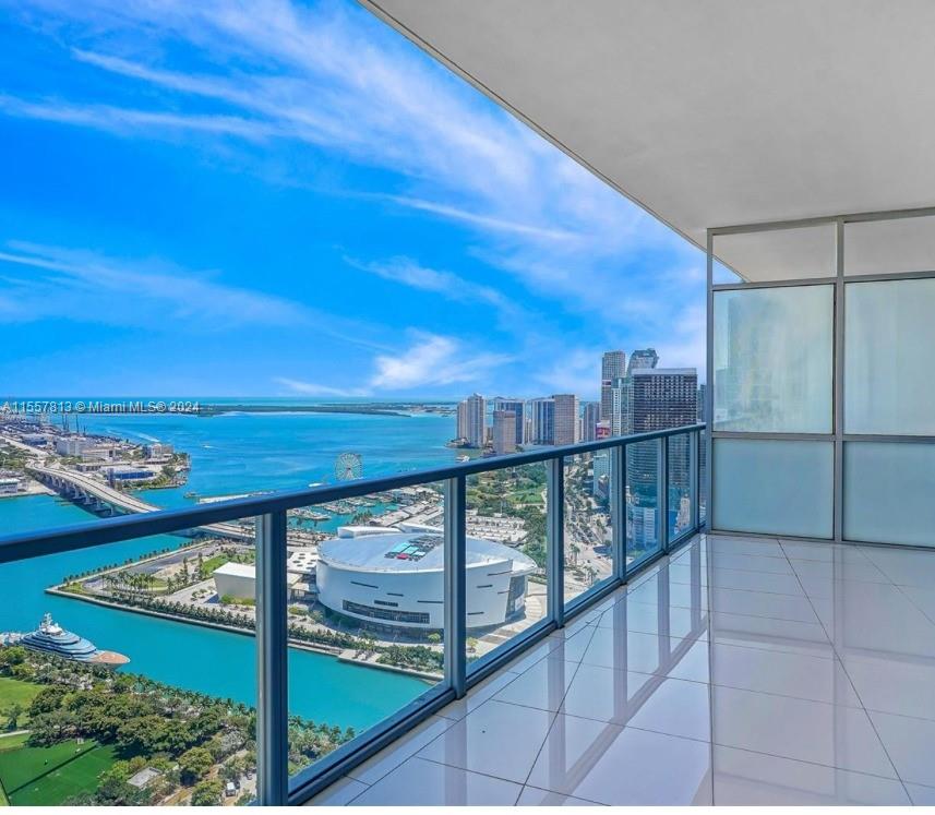 Stunning, Spacious & Bright unit with Panoramic City, Bay & Ocean Views. Finished to perfection with high ceilings, open kitchen, walk-in closets and an expansive private terrace, electric blinds & Private double elevator foyer entry. Master Suite w Direct Views of the Bay & Ocean. Bayfront Pool, Fitness Center & Spa with 24 hr Concierge & Security. Just a few steps to the Waterfront Park, Perez Art Museum, Frost Science Museum, Kaseya Center. FULLY FURNISHED!