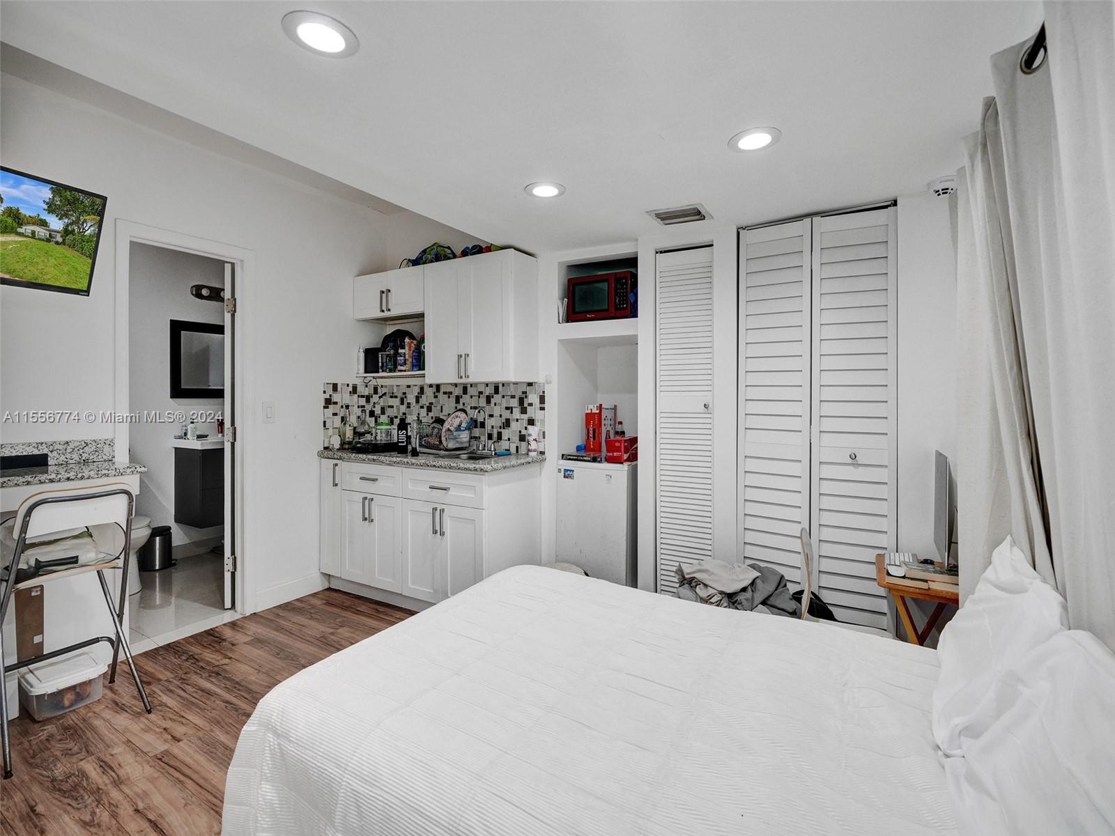 Small Closet and kitchen counter, includes fridge and microwave