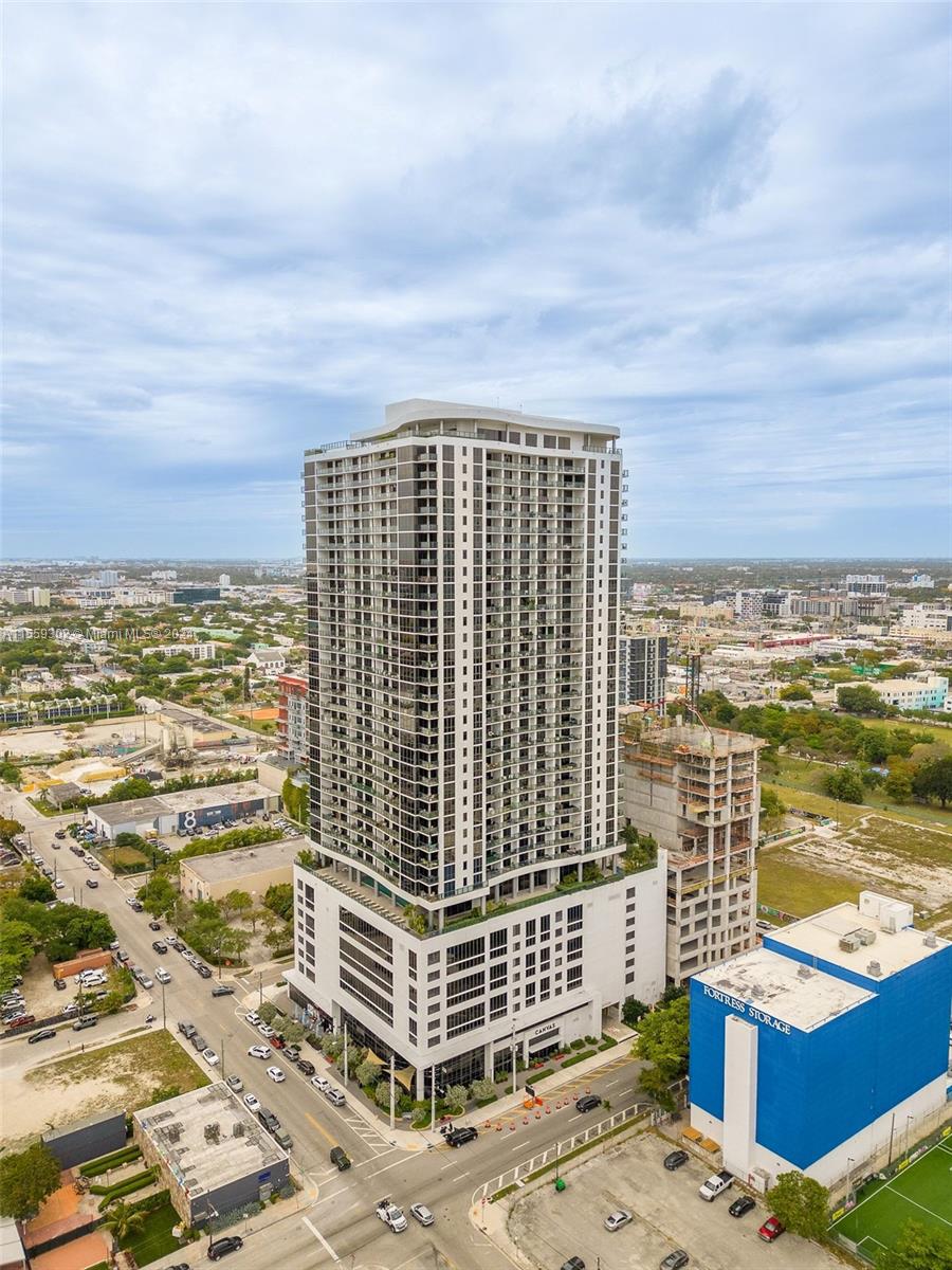 Canvas is a beautiful 37-story luxury building ideally located in the Miami Arts & Entertainment District -walking distance to shopping, dining and entertainment venues. This 29th floor residence w/floor-to ceilings windows & the best water views in the building. 1BR/1.5BA+ den. Sleek, European-style kitchen features white cabinetry & breakfast bar w/seating. Mthly maintenance fees include: Wifi, water & cable. Over 30,000 SF of 1st class resident amenities: state-of-the art fitness center, spa & sauna, yoga & massage rooms, theater, business center, clubhouse room, racquetball court, restaurant, pet playground & 3 pools.