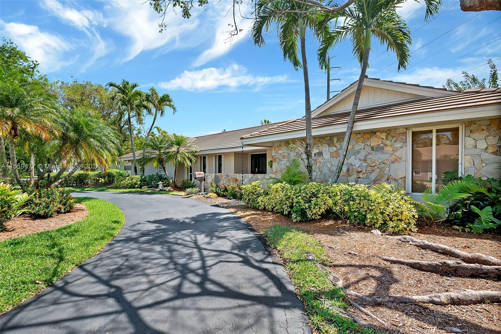 Welcoming 4 bedroom/ 2.5 bath home on an oversized, park-like lot (including a second folio) totaling 31,036 sq ft in a wonderful pocket of North Palmetto Bay. Great floorplan includes formal living and dining rooms. Lovely family room with fireplace and built in book shelves. Kitchen with breakfast nook has French doors leading to the patio. Tile and laminate flooring. Primary suite with walk in closets, updated bath with dual sinks and shower, overlooks screened pool and patio. Indoor laundry room. Circular driveway with side entry 2 car garage. Amazing lot with space for tennis court, and potential for so much more.