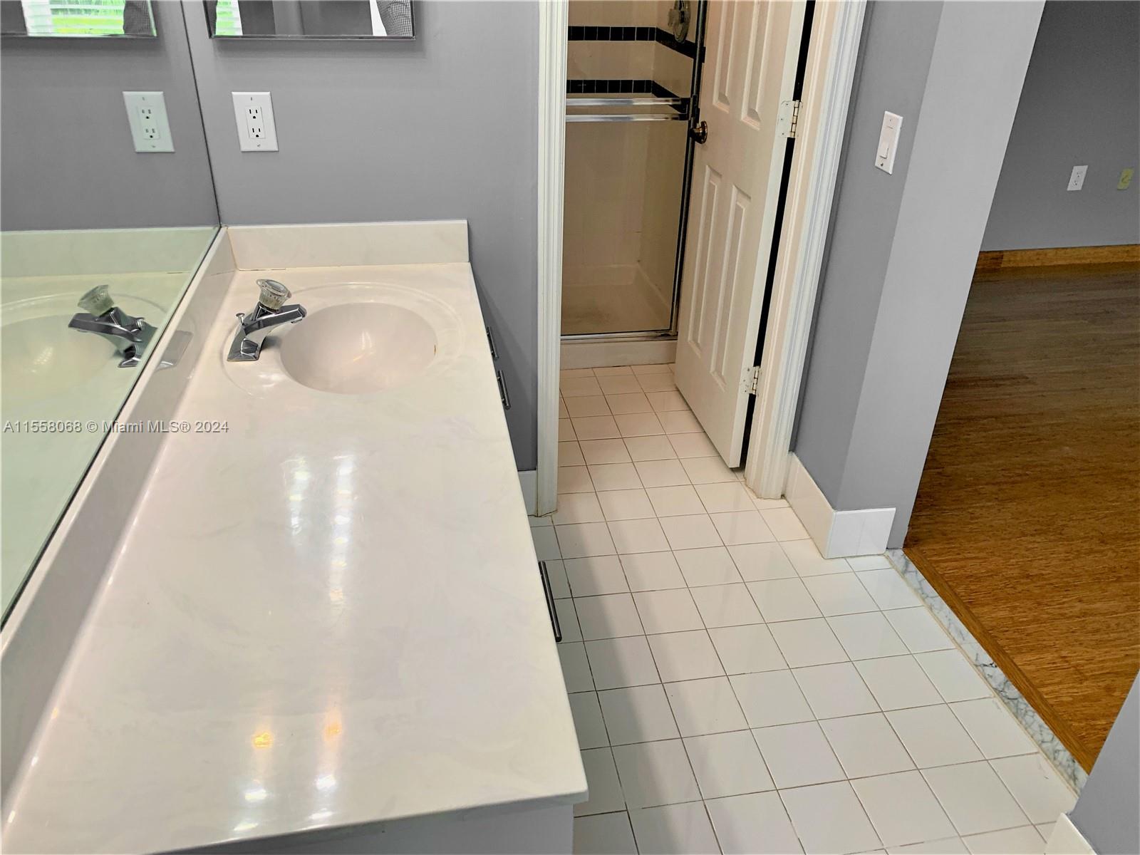 Primary Bathroom has separate tub and shower