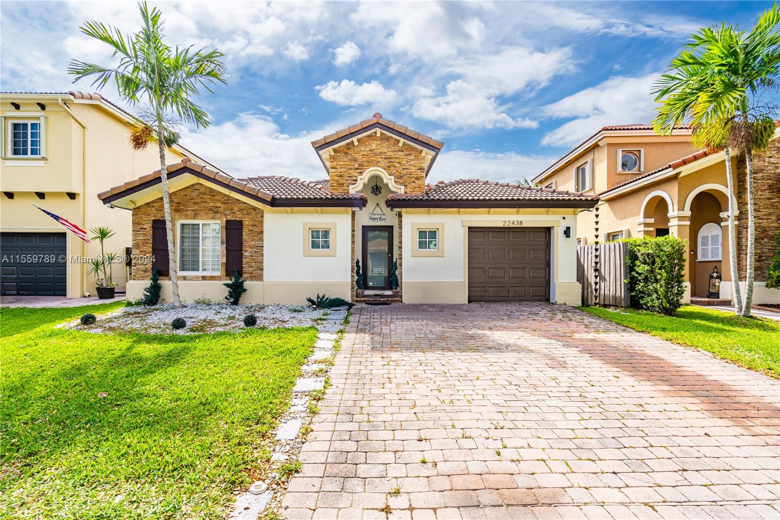 Located in The Enclave, a sought-after community in Cutler Bay, discover this stunning 3 bedroom, 2.5 bath home with a tranquil lake view. Fully remodeled kitchen with high-end appliances and oversized island. The home has a custom open layout with large porcelain tiles, new chandeliers, high-hat lighting, and motorized blinds. Enjoy the convenience of impact windows/doors, impact garage door, and an outdoor area with a pergola for lakefront entertainment. Freshly painted 3 yrs ago, plus a newer A/C and water heater. Embrace luxurious living in this lakeside sanctuary