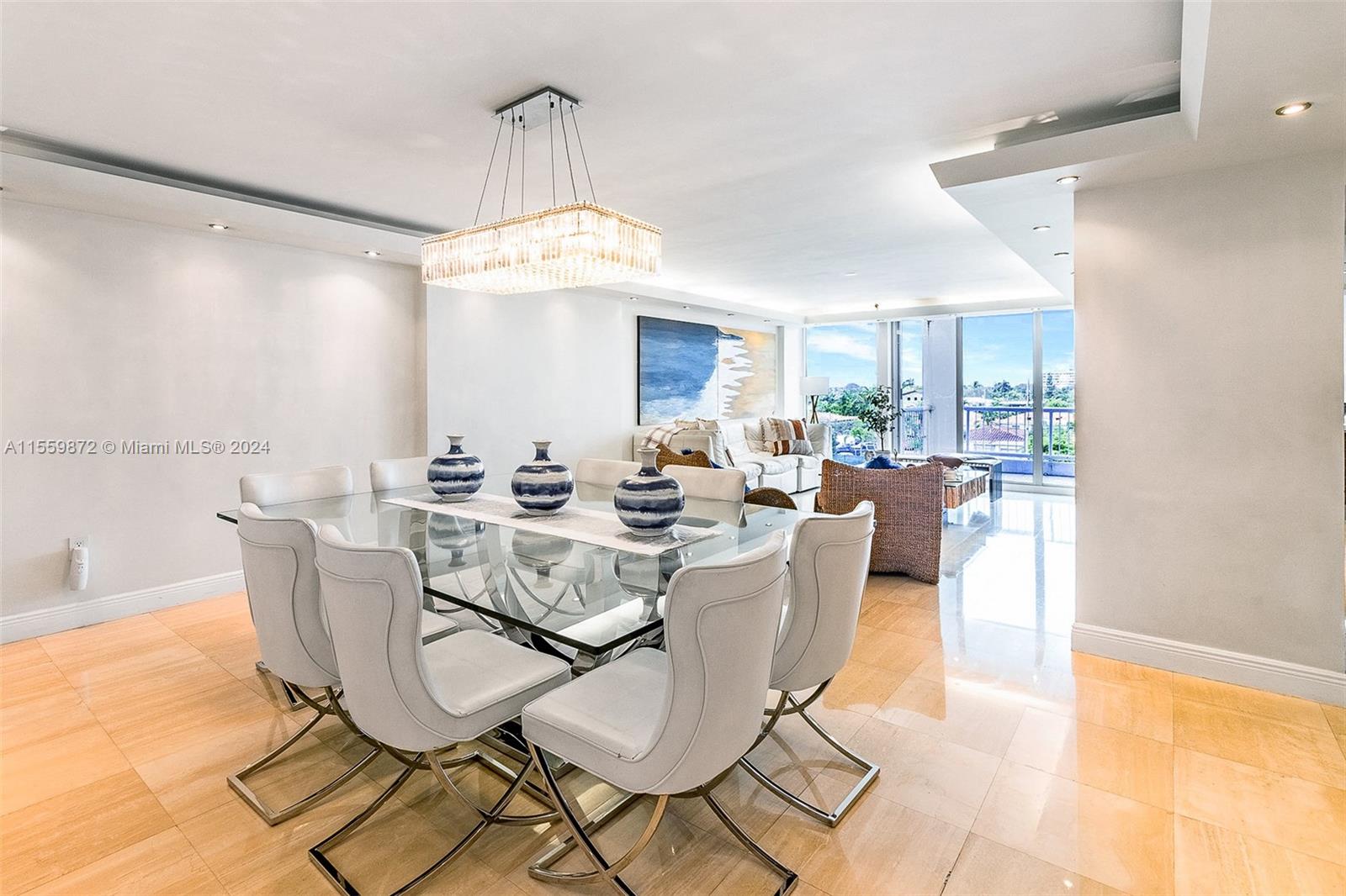 Welcome to this exquisite 3 Bed, 2.5-bath fully renovated apt in prime Surfside Location. This smartly designed residence boasts a sleek, modern kitchen equipped w/ top-of-the-line Thermador appliances, double sink, double oven & stylish Snaidero kitchen cabinets. The apt. features marble flrs throughout & flr-to-ceiling windows, offering an abundance of natural light and a sense of openness. This apt. also includes a washer/dryer & 2 garage spots.  Building Amenities: heated pool, gym, lounge/party room, Shabbat elevator, and a full-time doorman. 

Located just 1-2 blocks from the vibrant Surfside Shopping District, renowned restaurants, Bal Harbour Shops, places of worship & the Surfside Community Center. Don't miss the opportunity to make this stunning apartment your new home.