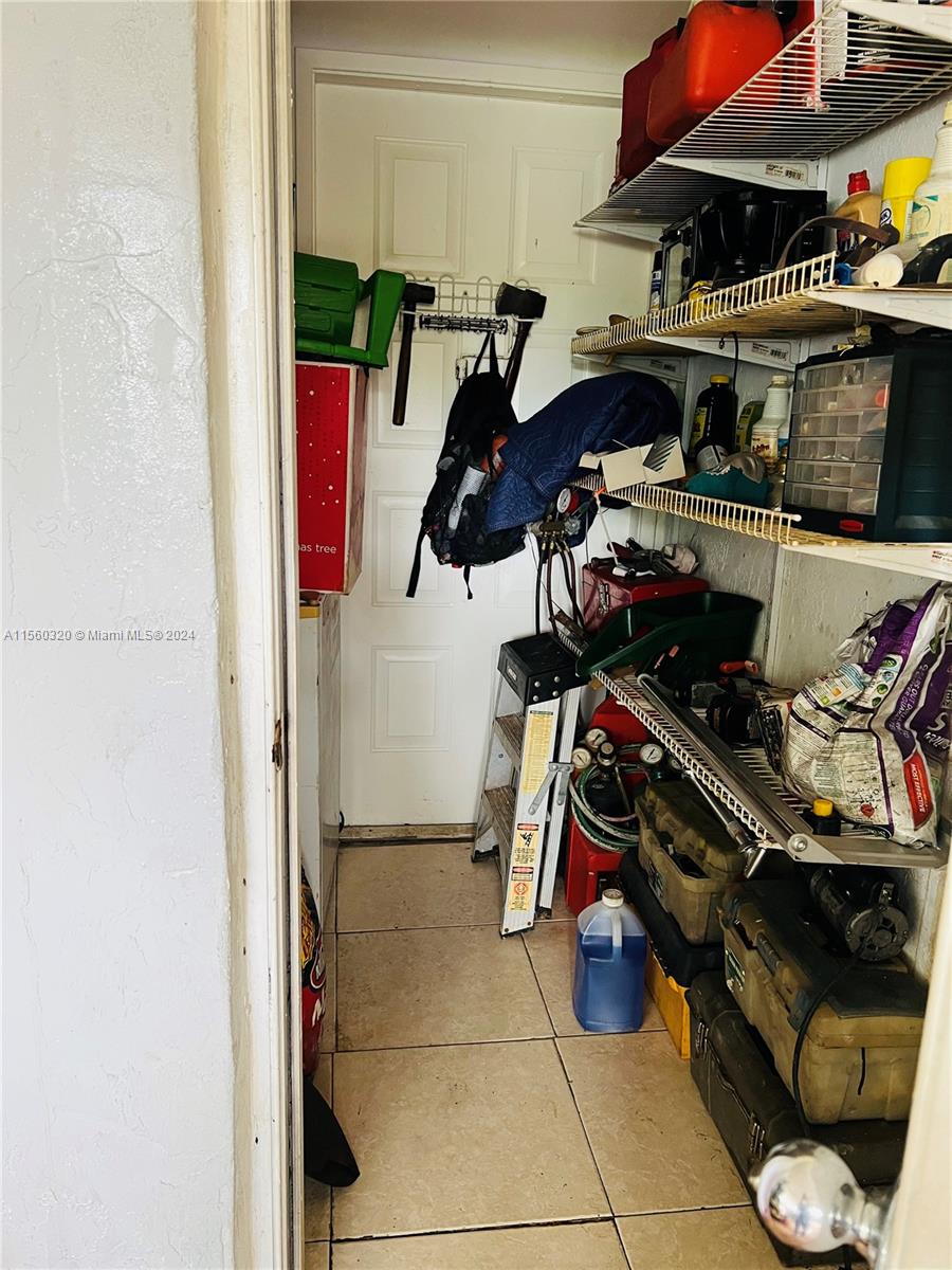 Storage Closet with door to Back